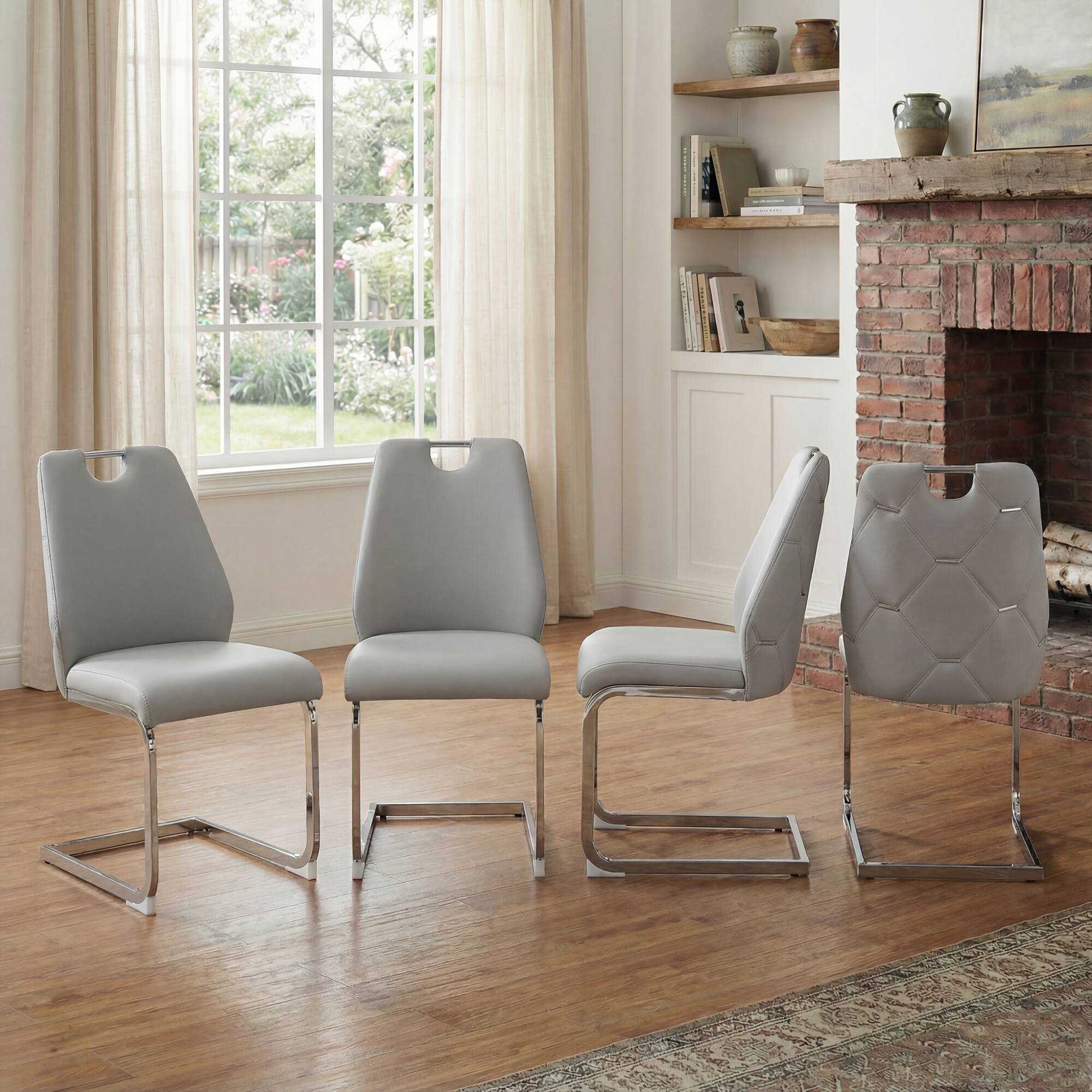 Front. GOODSILO - Set of 4 Modern Faux Leather Dining Chairs with Gold Mesh Texture and Chrome Accents - Light Gray.