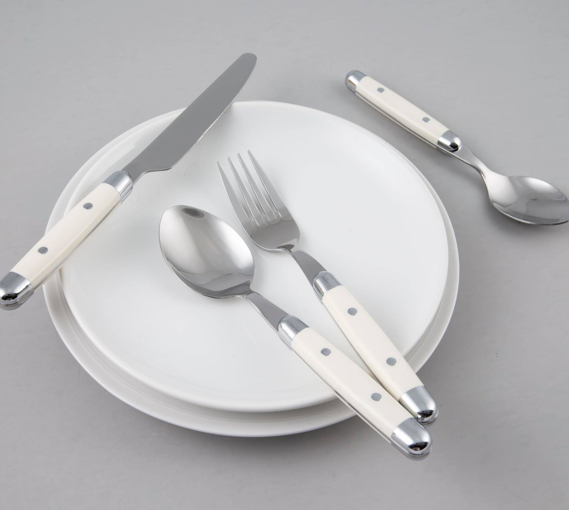 Alt View 1. Dazzed Corner - Silverware Set, 16-Piece Flatware Set, Service for 4, 18/0 Stainless Steel, Dishwasher Safe - White.