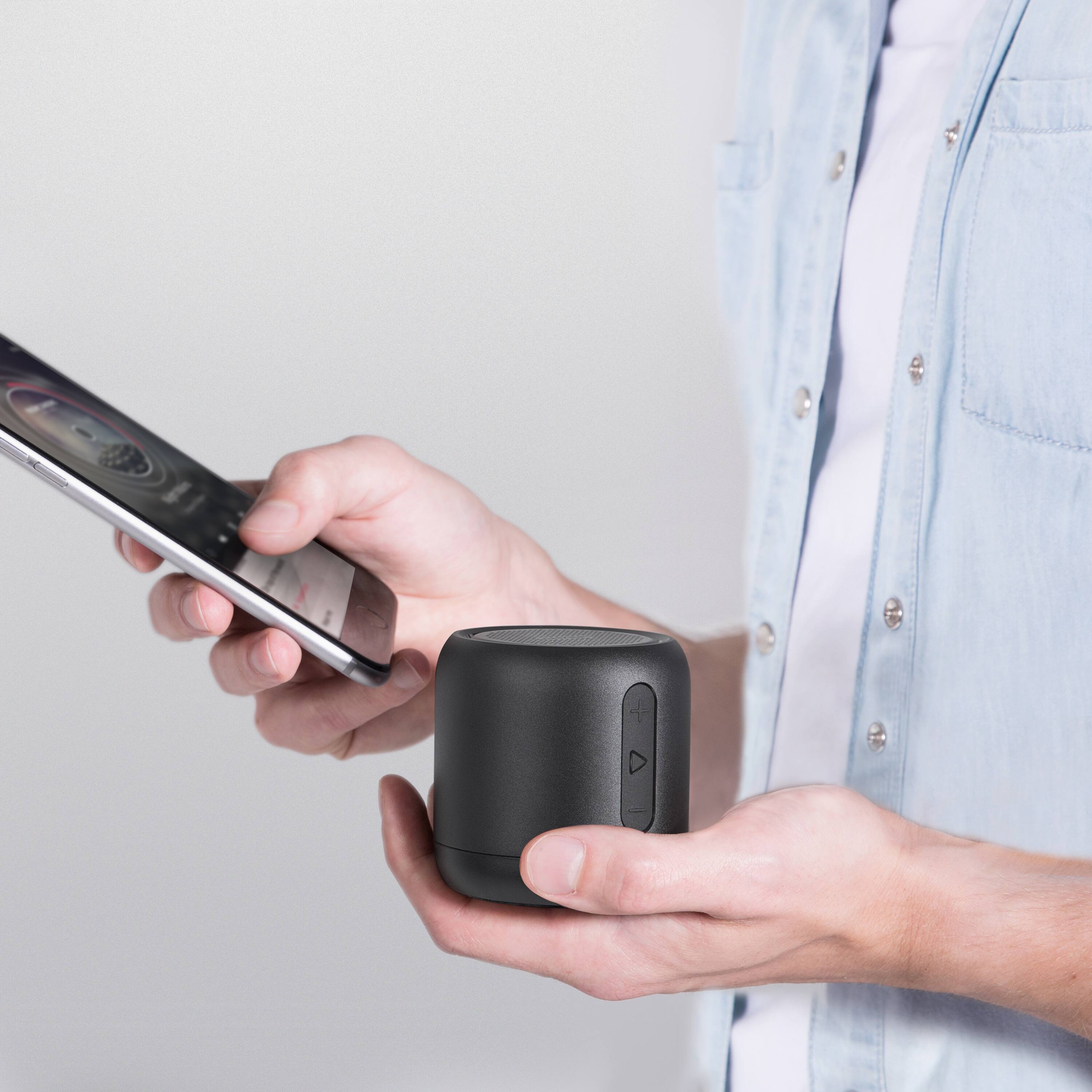 Left. Soundcore - by Anker Mini Super-Portable Bluetooth Speaker with FM Radio and 15-Hour Playtime - Black.