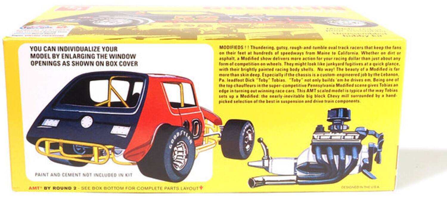 YOU CAN INDIVIDUALIZE YOUR MODEL BY ENLARGING THE WINDOW OPENINGS AS SHOWN ON BOX COVER

MODIFIEDS!! Thundering, gutsy, rough-and-tumble oval track racers that keep the fans on their feet at hundreds of speedways from Maine to California. Whether on dirt or asphalt, a Modified show delivers more action for your racing dollar than just about any form of competition on wheels. They might look like junkyard fugitives at a quick glance, with their brightly painted racing body shells. No way! The beauty of a Modified is far more than skin deep. Especially if the chassis is a custom engineered job by the Lebanon, Pa. leadfoot Dick "Toby" Tobias. "Toby" not only builds 'em but drives 'em. Being one of the top chauffeurs in the Pennsylvania Modified scene gives Tobias an edge in turning out winning race cars. This AMT scaled model is typical of the way Tobias sets up a Modified: the nearly-invisible big block Chevy mill surrounded by a hand-picked selection of the best suspension and drive train components.

PAINT AND CEMENT NOT INCLUDED IN KIT

AMT BY ROUND 2 - SEE BOX BOTTOM FOR COMPLETE PARTS LAYOUT

DESIGNED IN THE U