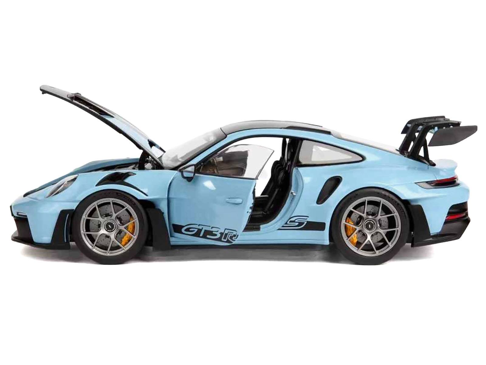 Left. Norev - 2022 Porsche 911 GT3 RS Weissach Pack Gulf Blue with Carbon Top and Hood Stripes 1/18 Diecast Model Car by Norev - Blue.