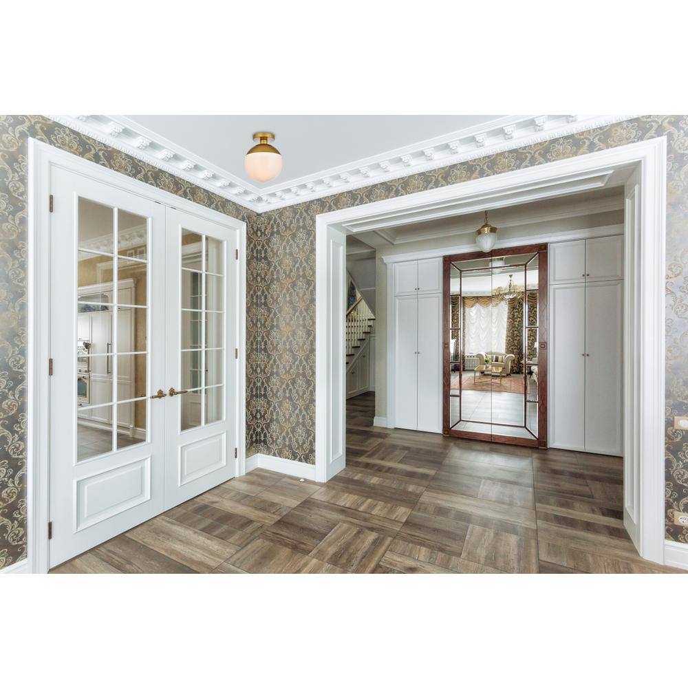 Angle. Living District - Eclipse 1 Light Brass Flush Mount With Frosted White Glass - Brass And Frosted White.