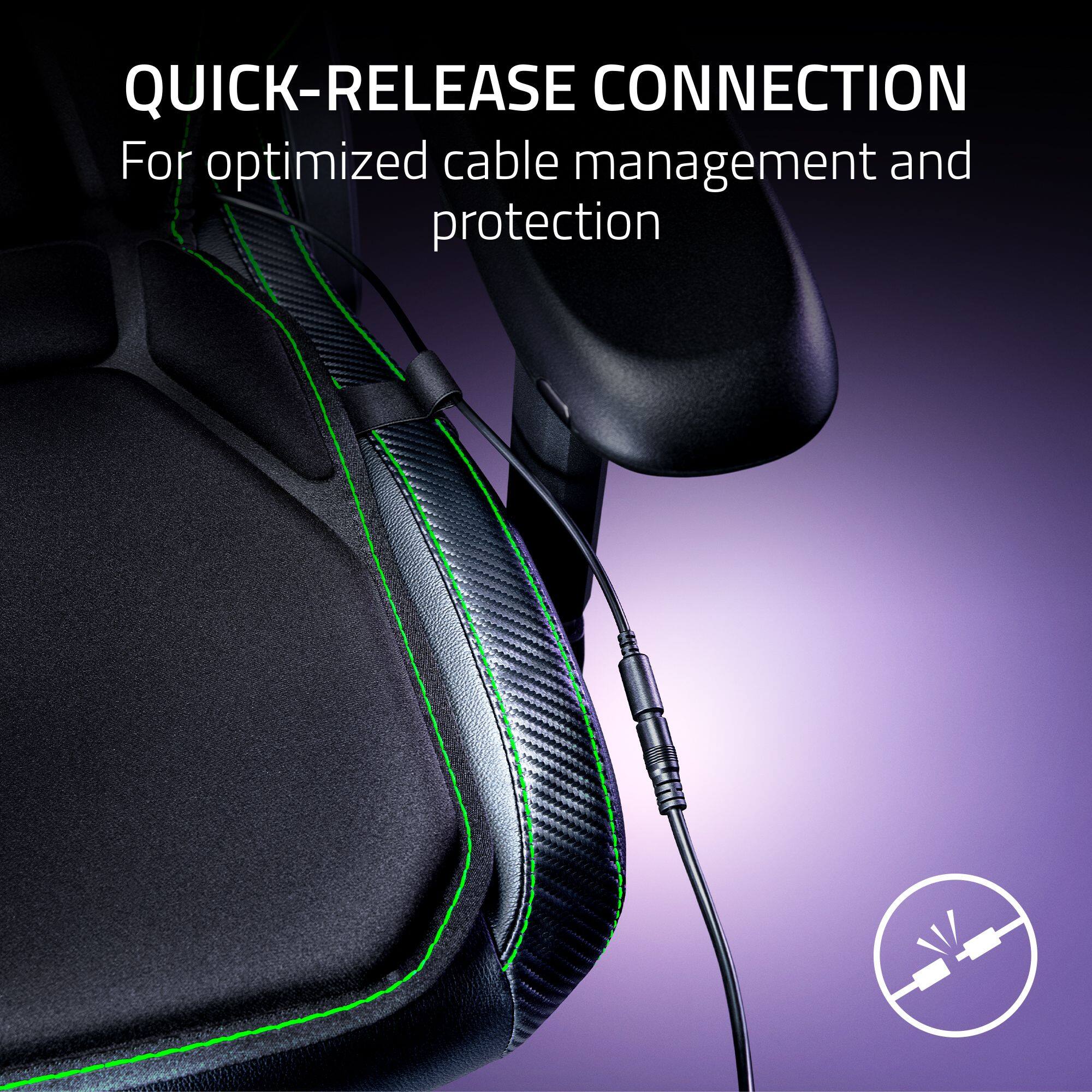 The image shows a chair with a green and black design, and it has a quick-release connection for optimized cable management and protection.