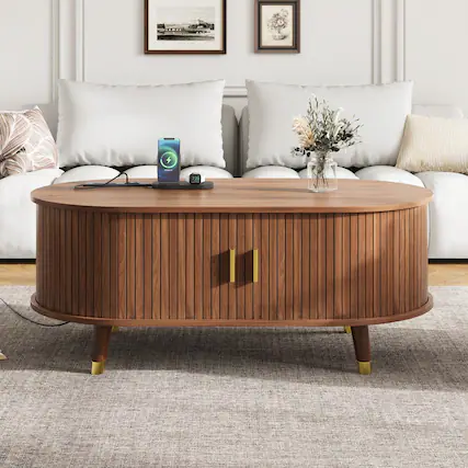 Front. Lirago - 43" Century Farmhouse Wooden Oval Coffee Table Fluted Design with Charging Station Sliding Tambour Door Solid Wood Legs - Brown.