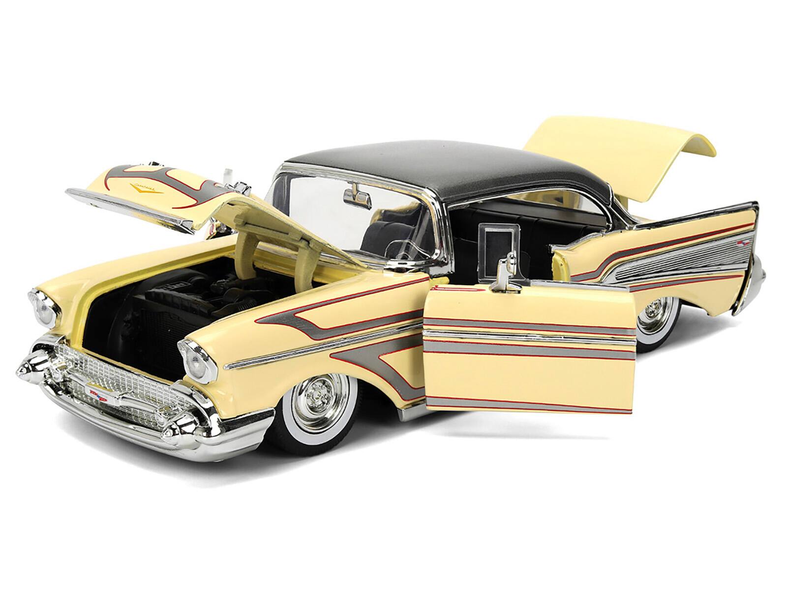 Angle. Jada - 1957 Chevrolet Bel Air Cream with Graphics and Gray Metallic Top "Bigtime Muscle" Series 1/24 Diecast Model Car by Jada - Cream with Gray Metallic.