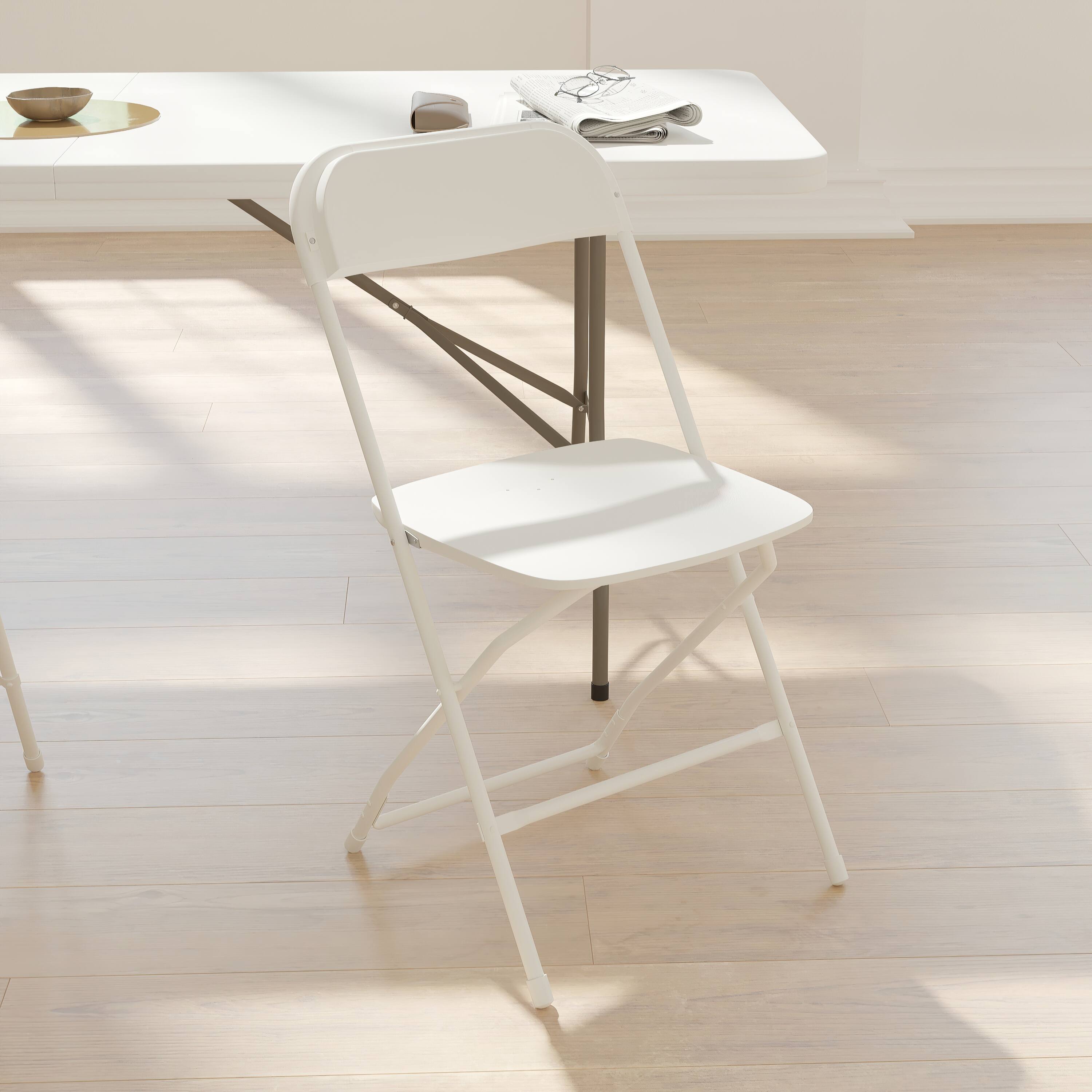 Alt View 4. Emma + Oliver - Plastic Folding Chair - 4 Pack 650LB Weight Capacity - White.