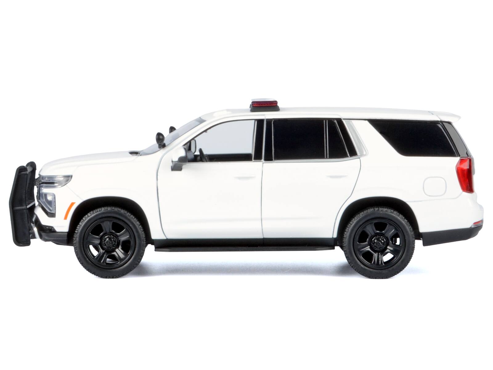 Left. Motormax - 2025 Chevrolet Tahoe PPV White "Custom Builder's Kit - Law Enforcement and Public Service" Series 1/24 - White.