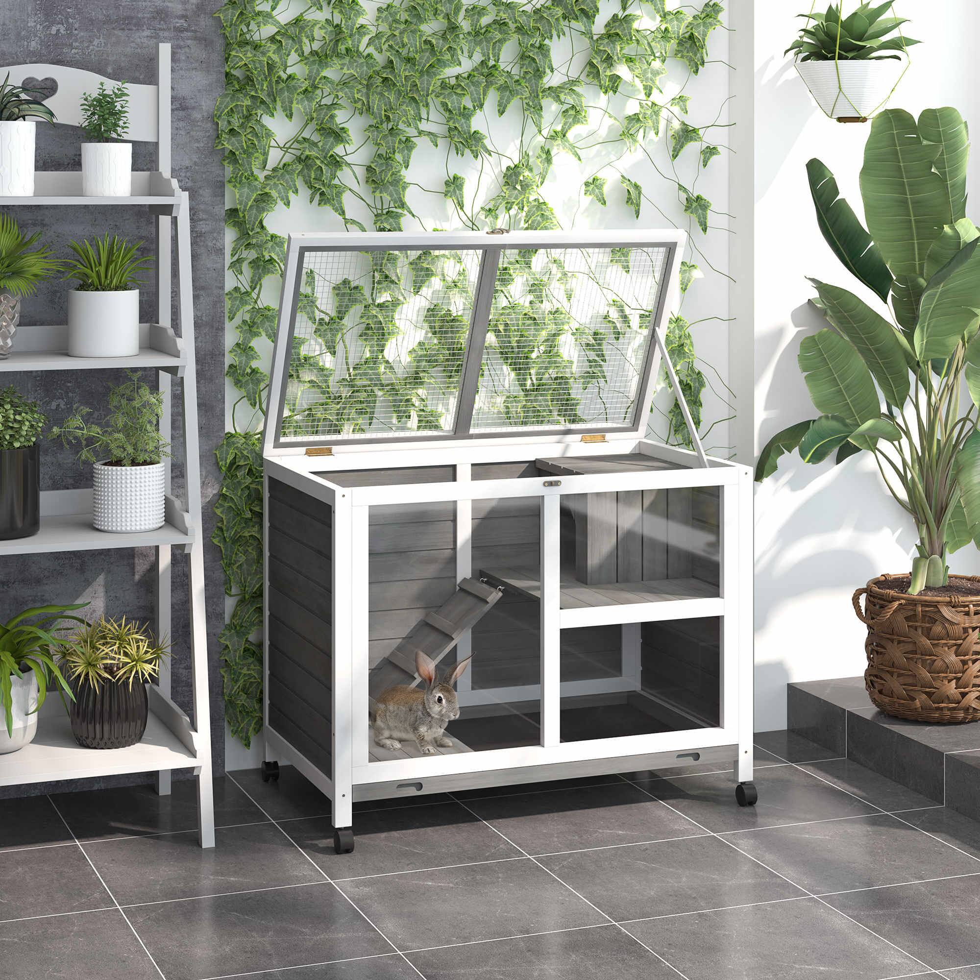 Angle. Pawhut - Rabbit Hutch with Wheels, Desk and Side Table Sized, Wooden, Waterproof, Removable Tray, Openable Roof.