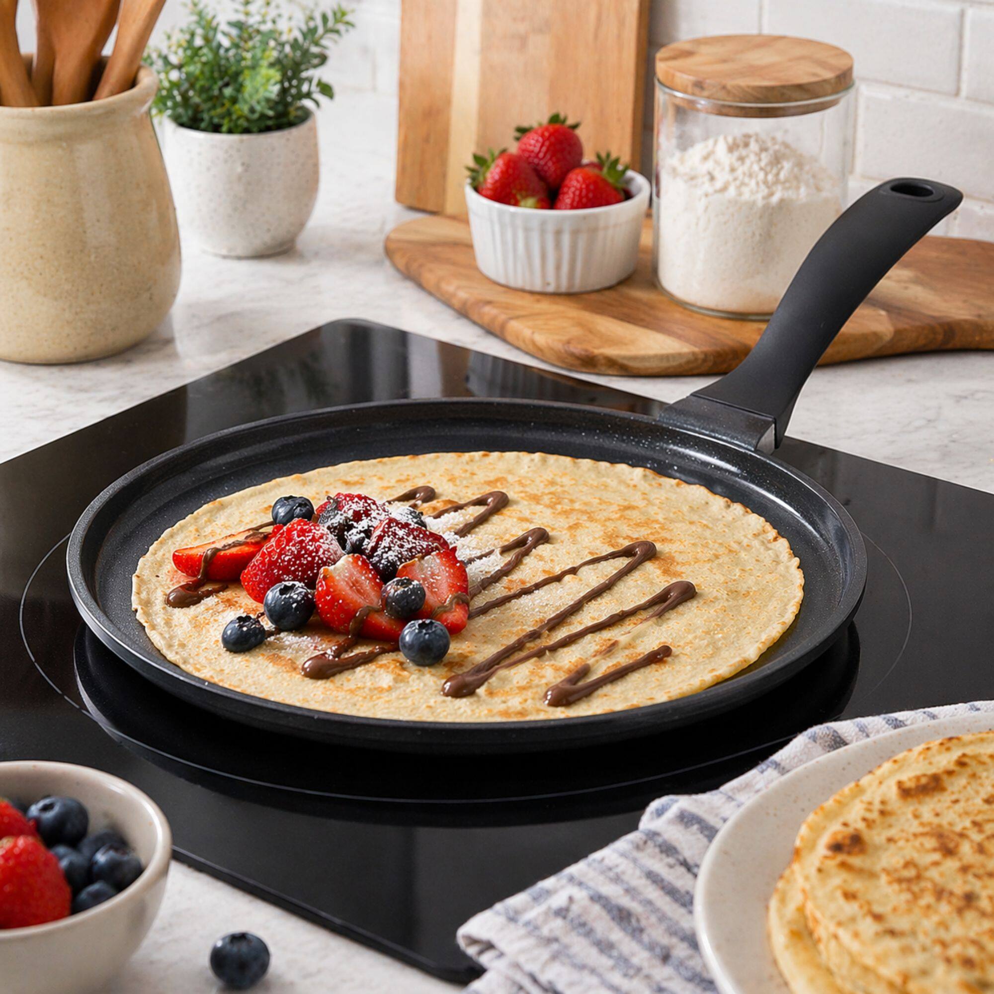Left. Alva - Alva Energy Ceramic Nonstick Crepe Pan, 11-inch Egg Pan, PFAS-Free Nonstick Griddle Pan - Black.