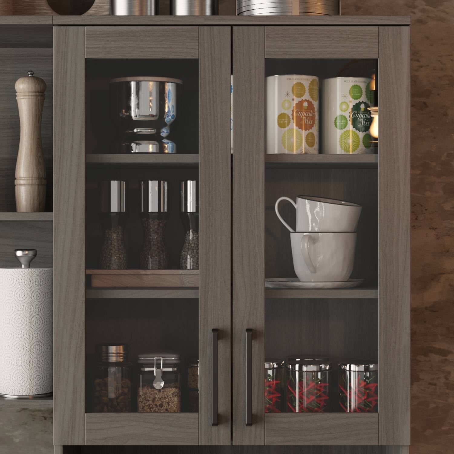 The image features a kitchen cabinet with various items stored inside. There are two cups, one on the top shelf and another on the bottom shelf. Additionally, there are two bottles, one on the top shelf and another on the bottom shelf. The cabinet also contains a spoon and a bowl, which are placed on the bottom shelf. The arrangement of these items suggests that the cabinet is well-organized and functional for storing kitchen essentials.