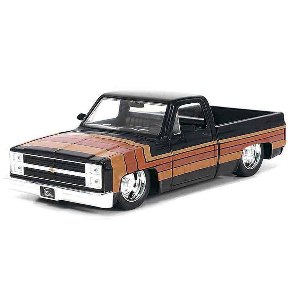 Left. Jada - 1985 Chevrolet C-10 Pickup Truck Black with Stripes and GM Rally Wheels "Just Trucks" Series 1/24 - Black.