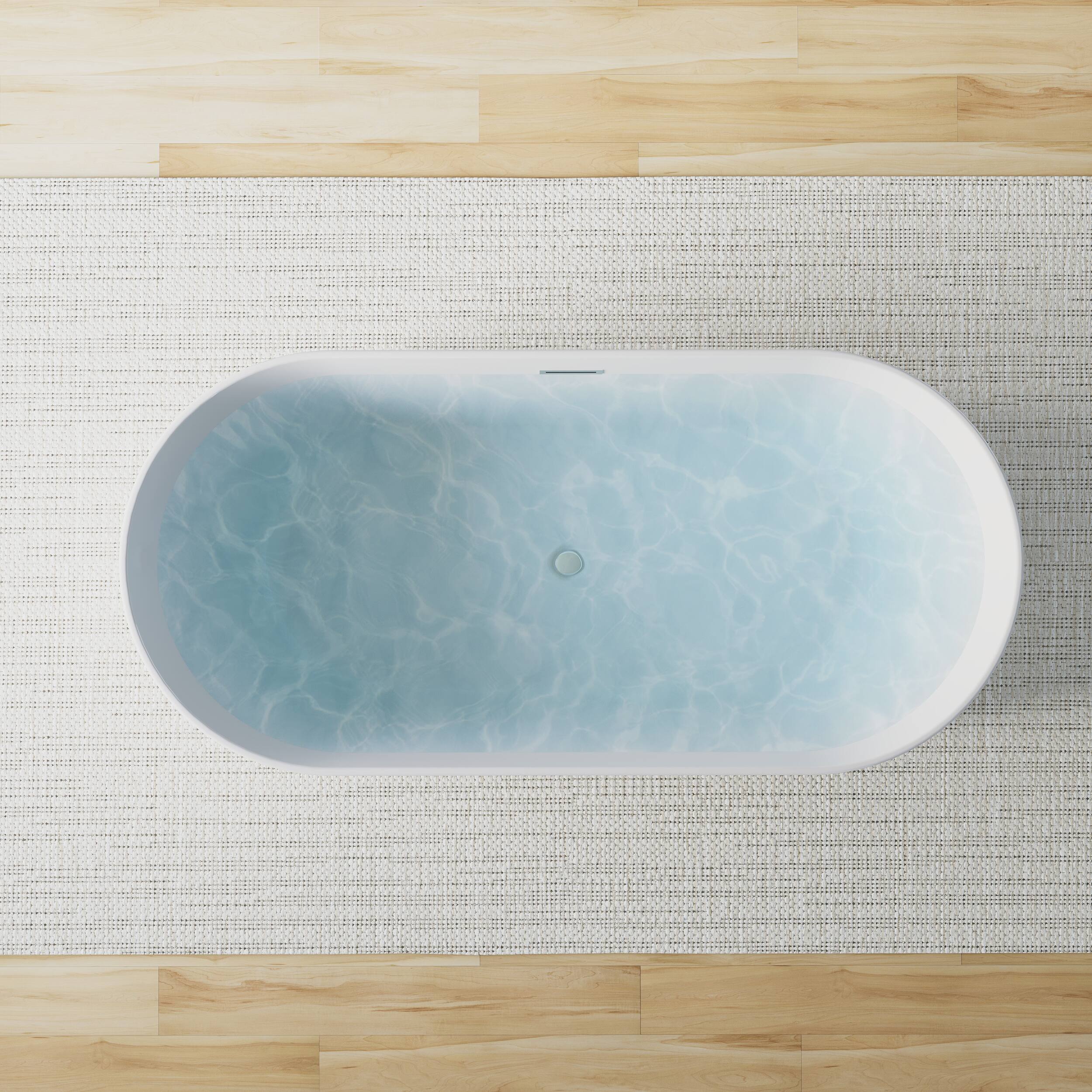 Angle. WELLFOR - Elego 67 in. x 31.5 in. Acrylic Oval Freestanding Soaking Bathtub with Center Drain and Overflow - White.