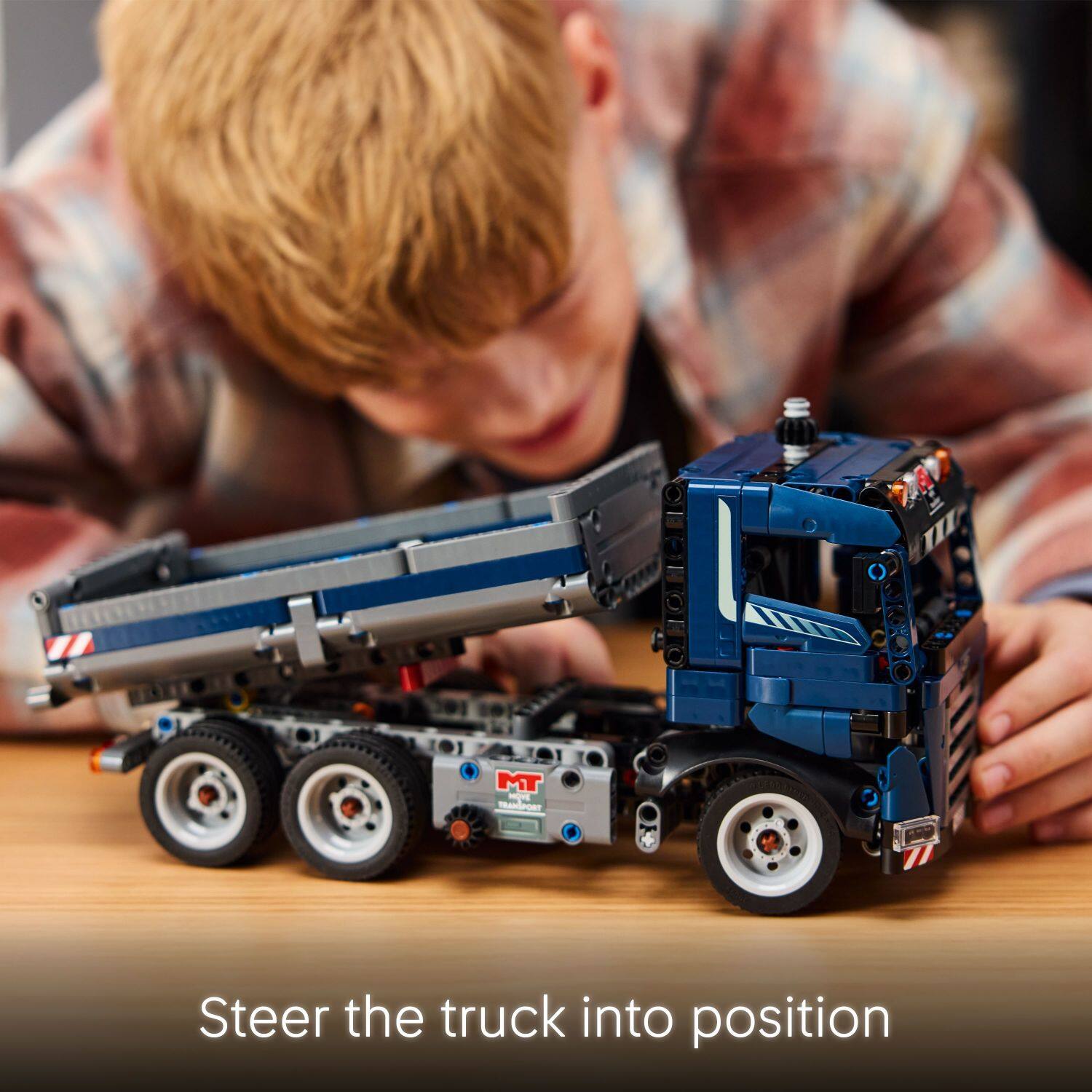 Steer the truck into position.