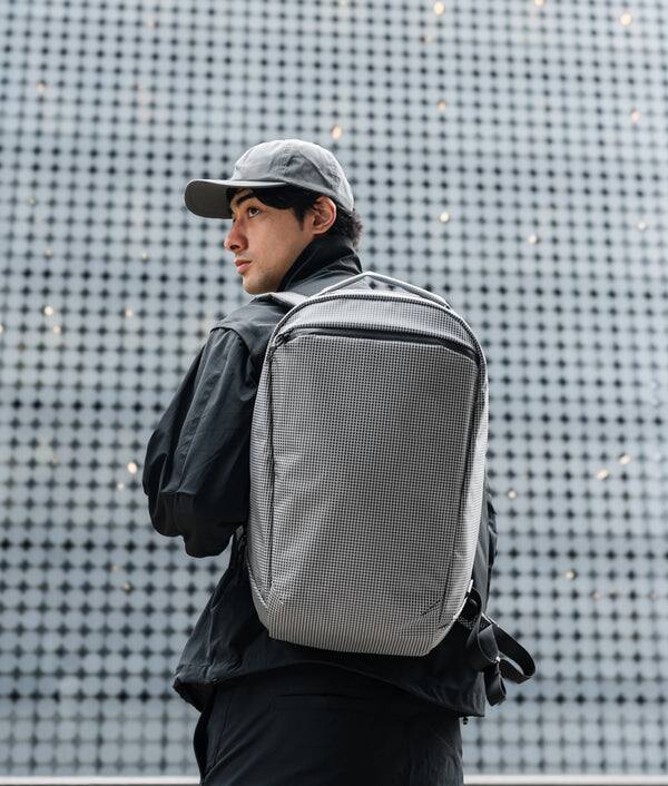 Alt View 9. ALPAKA - Lightweight 22L Laptop Backpack for 16-inch Laptop, Momentum Backpack for Work, Travel & Commuting, Weather-Resistant - Axodyne hybrid Grey.