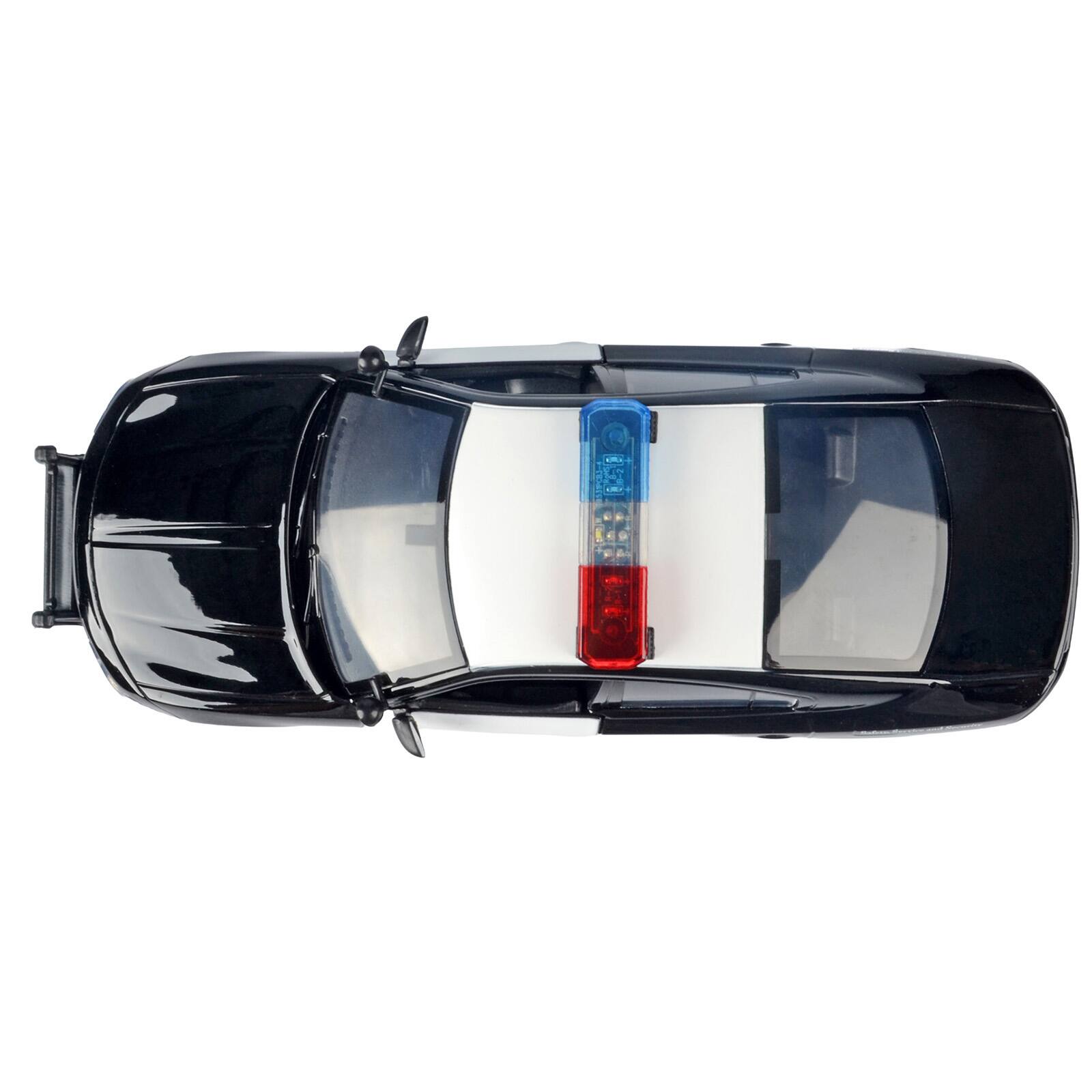 Alt View 4. Motormax - 2023 Dodge Charger Pursuit Police Car "CHP" Black and White with Flashing Lights and Sounds 1/24 Model Car by Motormax.