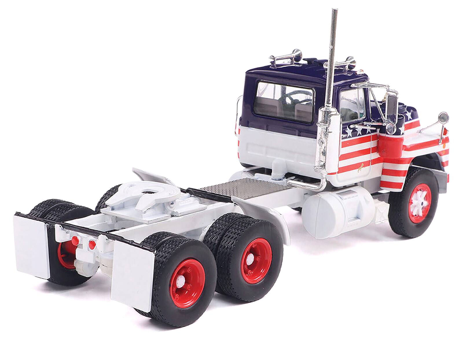 Left. IXO - 1966 Mack R Series Truck Tractor American Flag Livery 1/43 Diecast Model by IXO Models - White, Red, Blue.