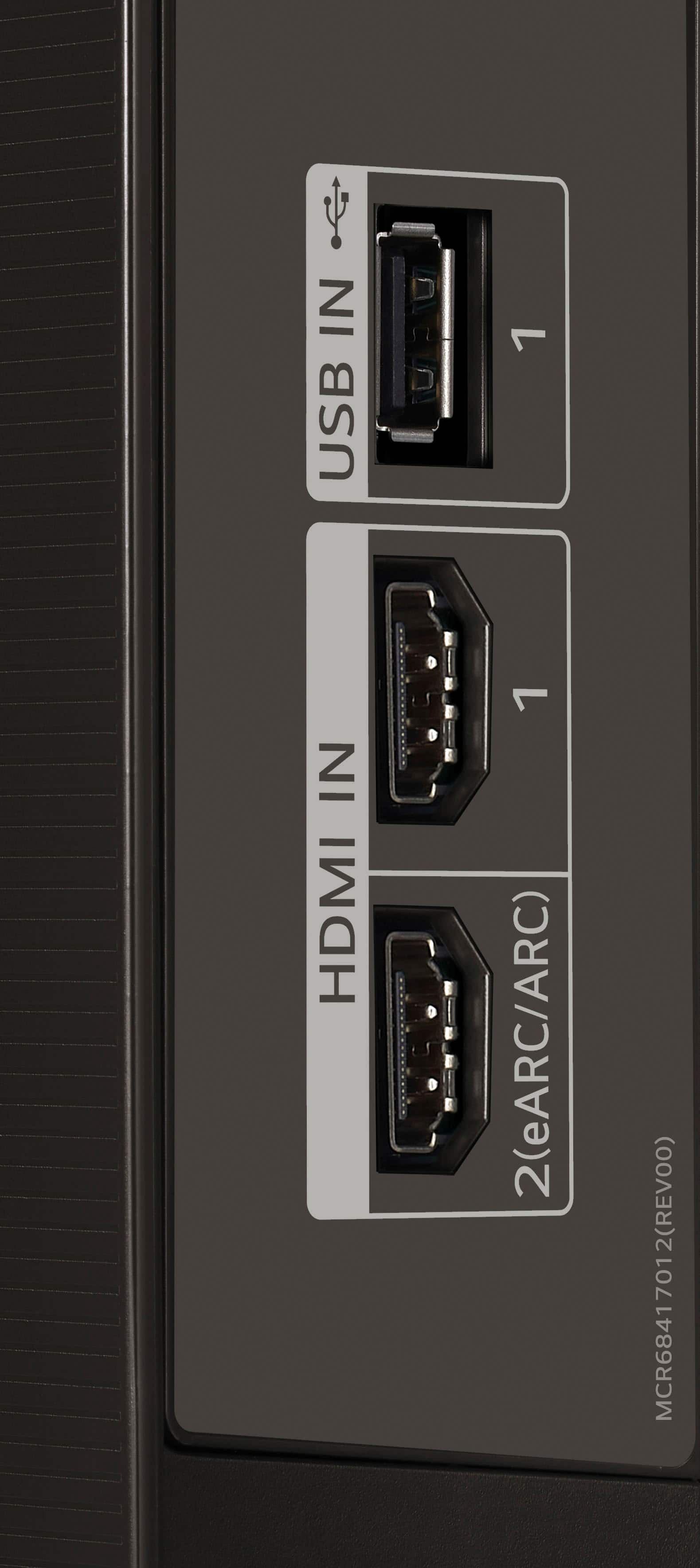 The text on the image reads: "IN USB 1 IN HDMI 2 (eARC/ARC) MCR68417012 (REVO0) 701."