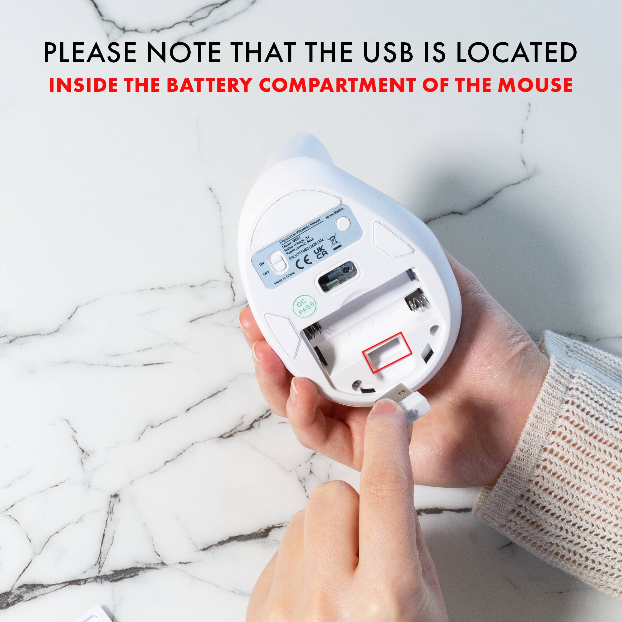 PLEASE NOTE THAT THE USB IS LOCATED INSIDE THE BATTERY COMPARTMENT OF THE MOUSE