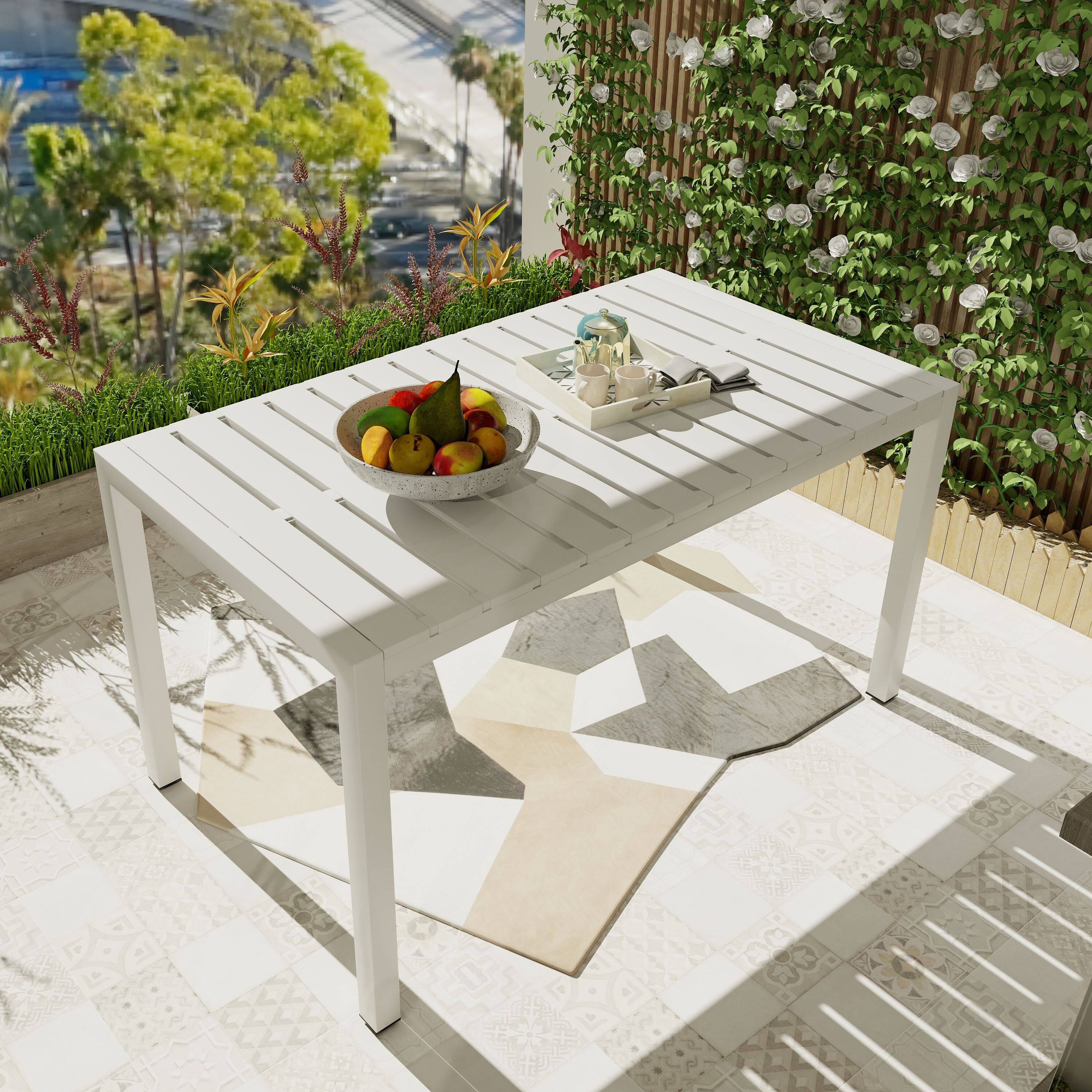 Angle. Mondawe - 55 Inch Outdoor Modern Dining Table, Lightweight PP Tabletop with Metal Legs - White.