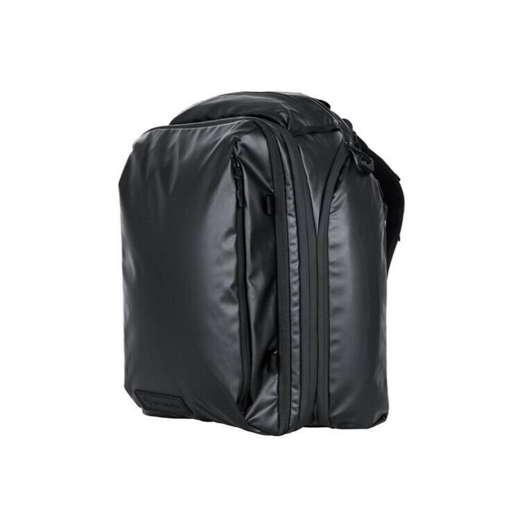 Angle. WANDRD - WANDRD Transit Travel Backpack with Dual Quick-Draw Side Access (Black, 45L) - Black.