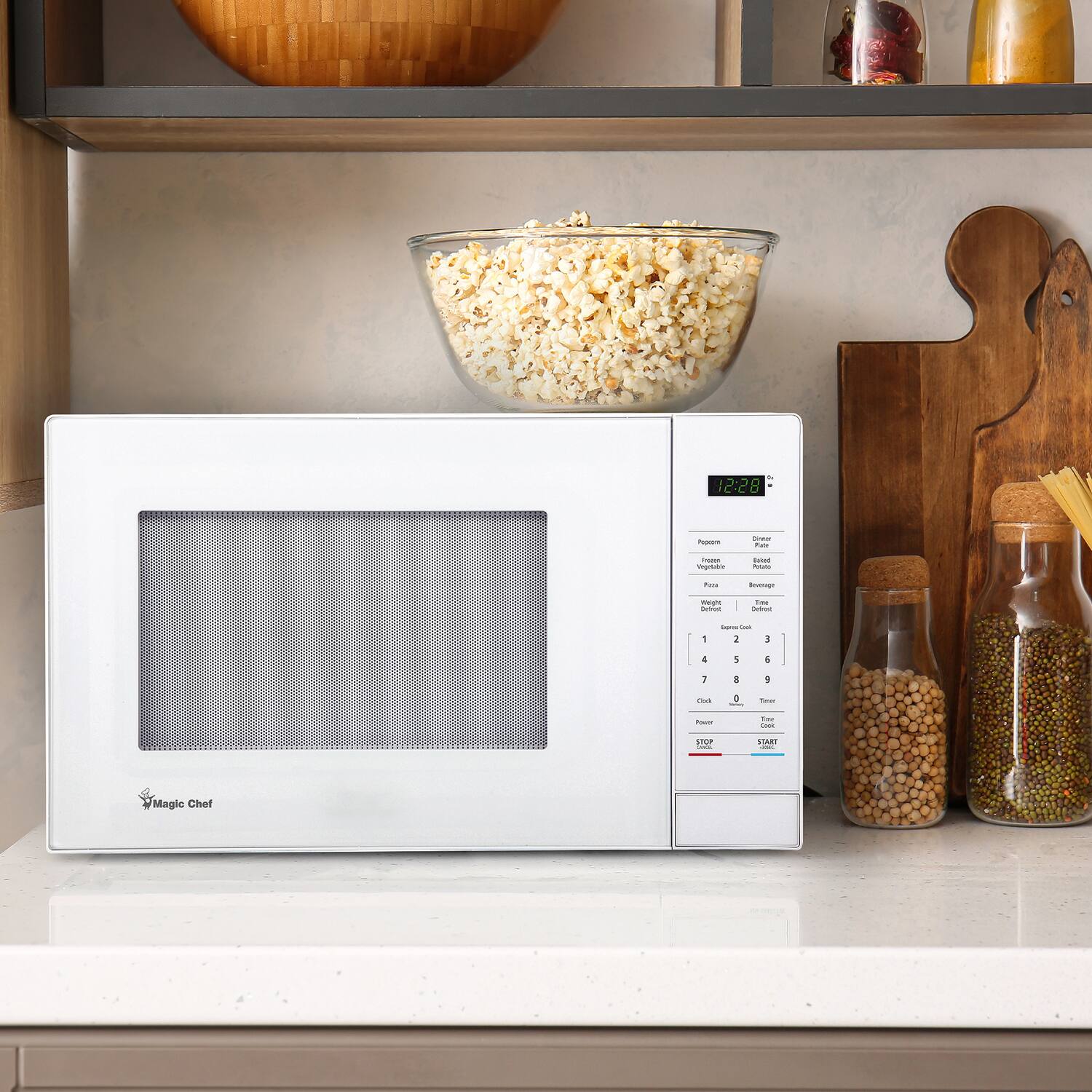 12:28  
Popcorn  
Chinese Food  
Prozen Vegetable  
Baked Potato  
Pizza  
Beverage  
Weight Defrost  
Time Brown  
Popcorn Casserole  
4  
6  
1  
8  
5  
Carb  
0  
Satay  
Forum  
Total Clock  
STOP ORGA  
START  
Magic Chef