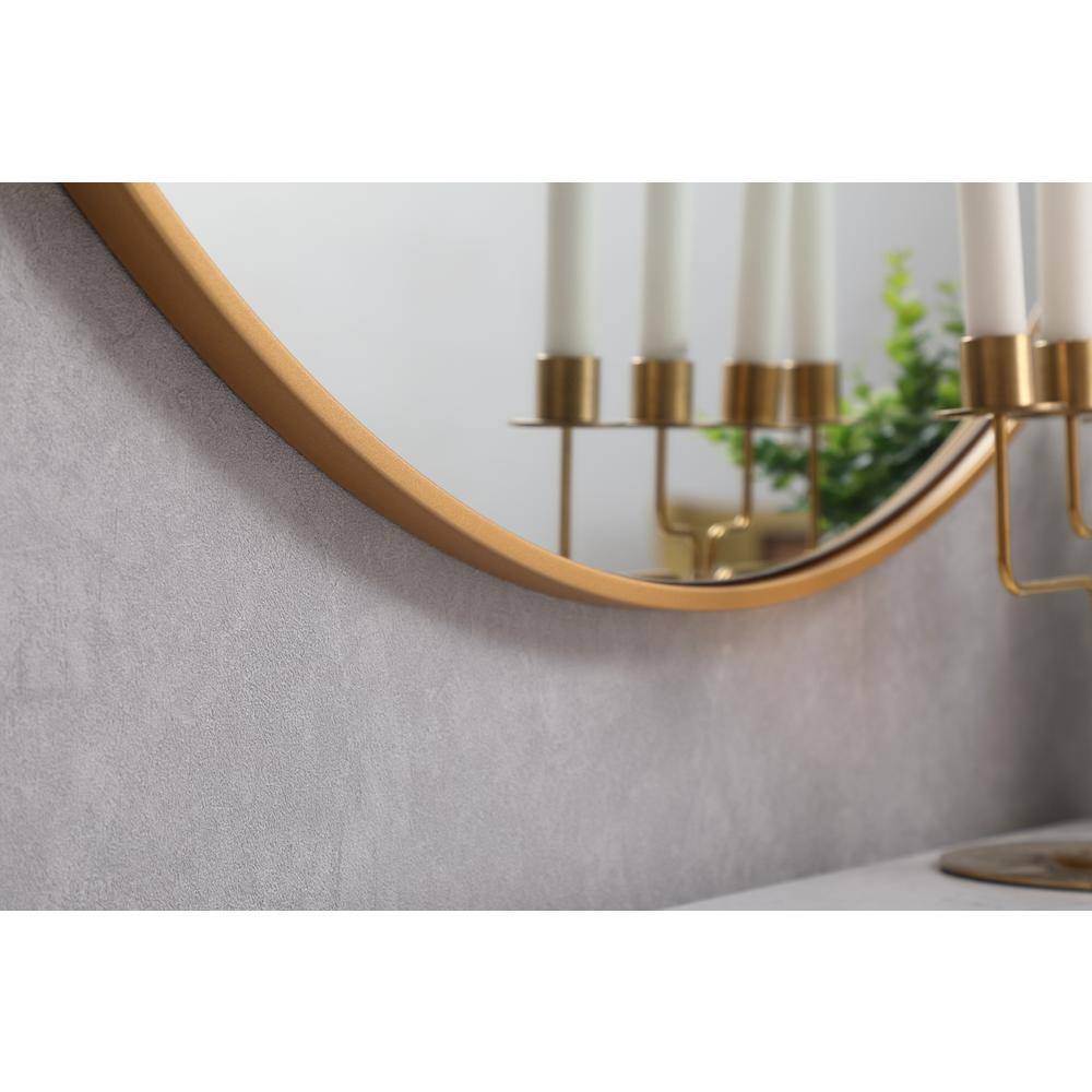 Left. Elegant Decor - Metal frame round mirror 39 inch in Brass - Brass.