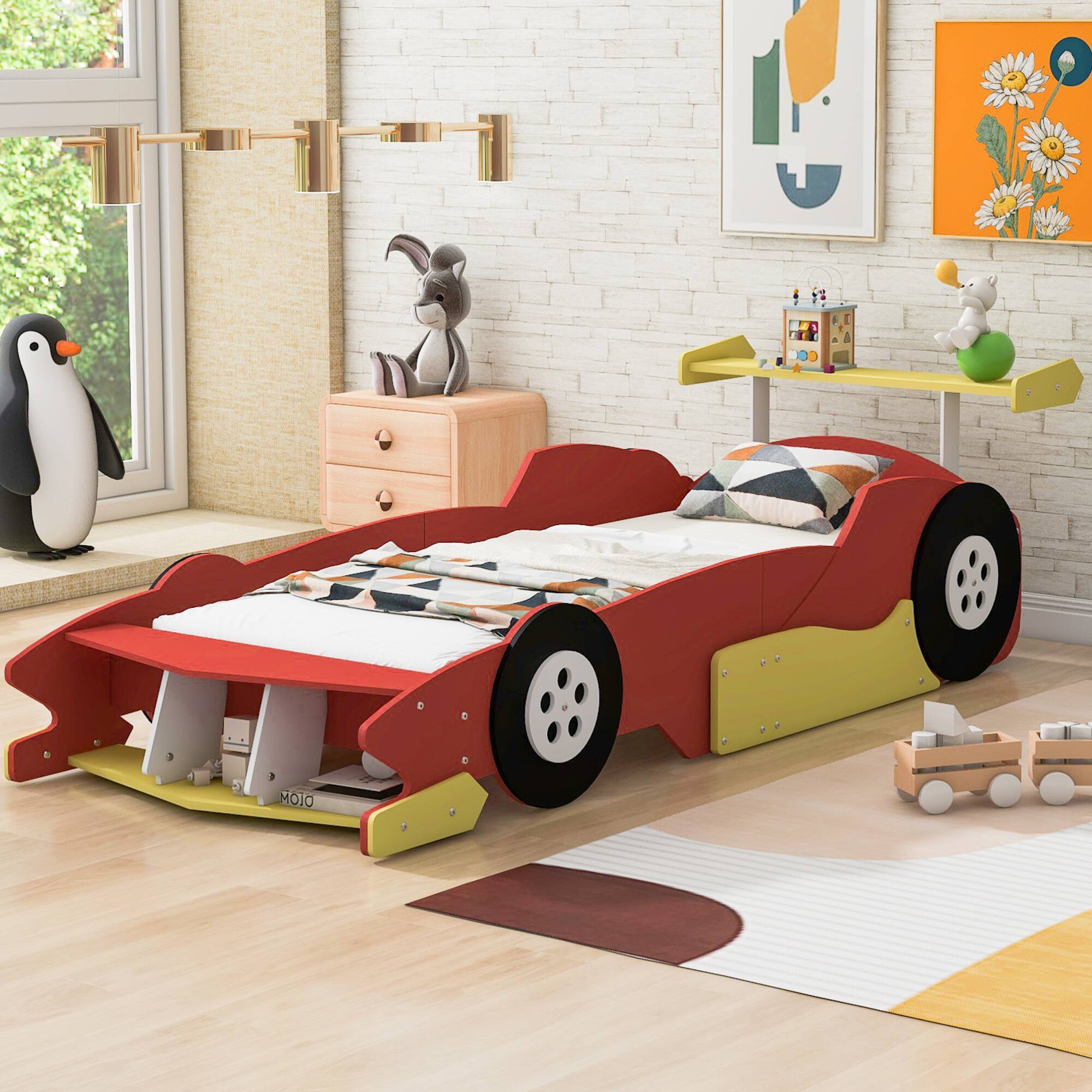 Angle. GOODSILO - Twin Size Youth Race Car Themed Platform Bed with Side Rails and Decorative Wheels - Red.