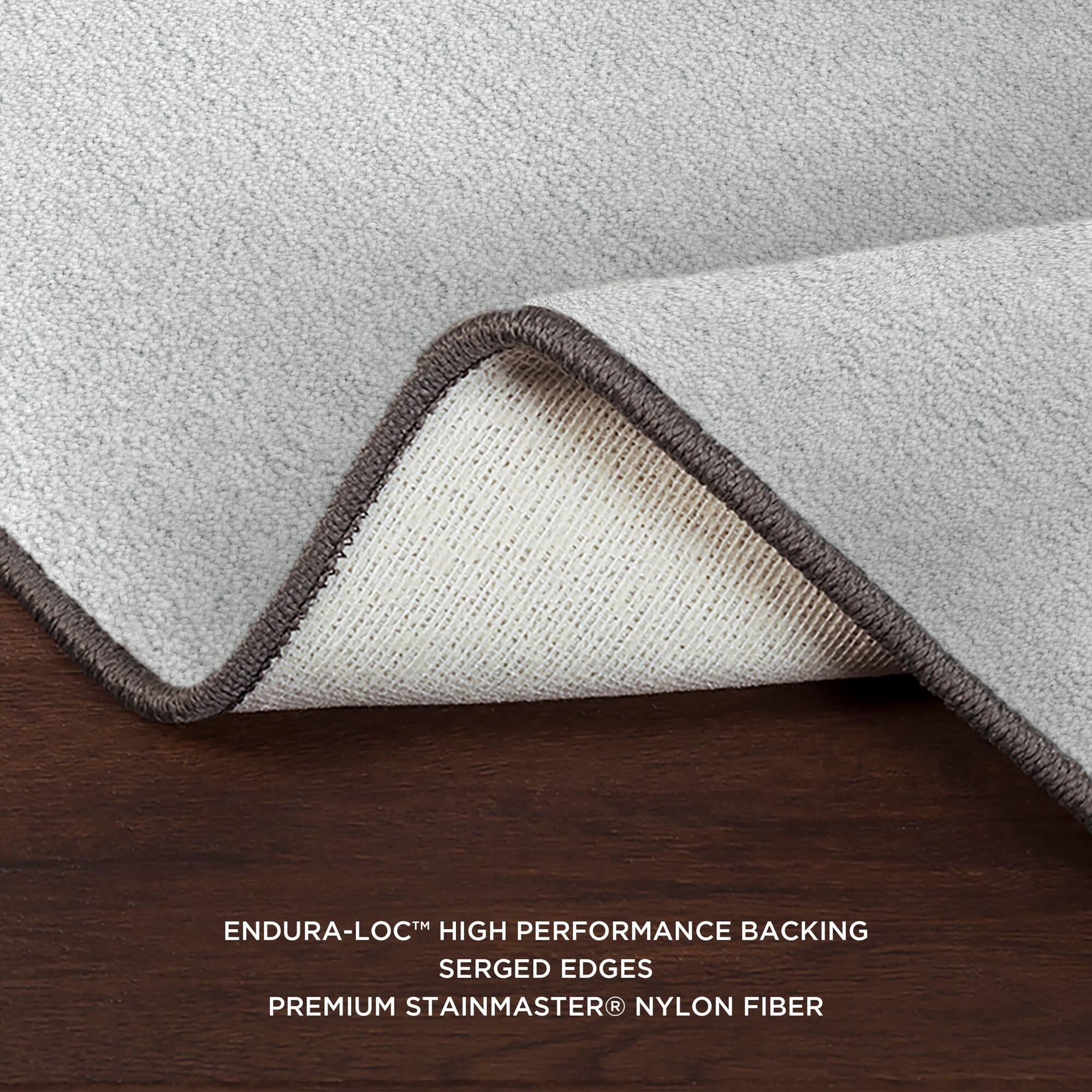 ENDURA-LOC™ HIGH PERFORMANCE BACKING  
SERGED EDGES  
PREMIUM STAINMASTER® NYLON FIBER