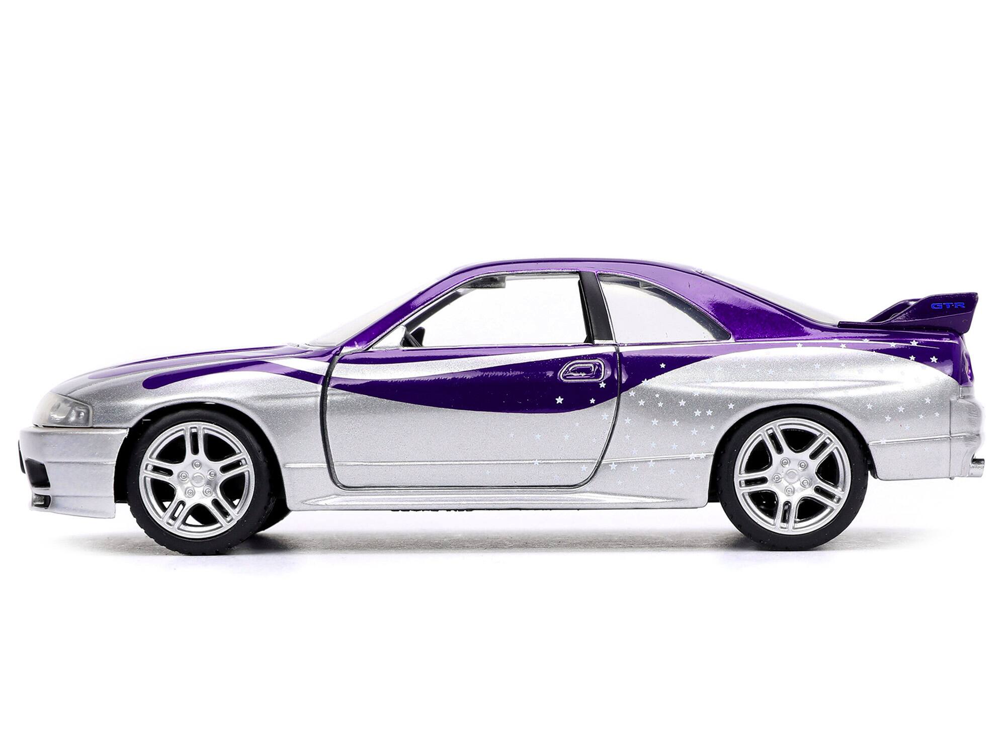 Left. Jada - 1995 Nissan Skyline GT-R (BCNR33) Purple and Silver Metallic "Fast & Furious" Series 1/32 Diecast Model Car by Jada - Purple and Silver Metallic.