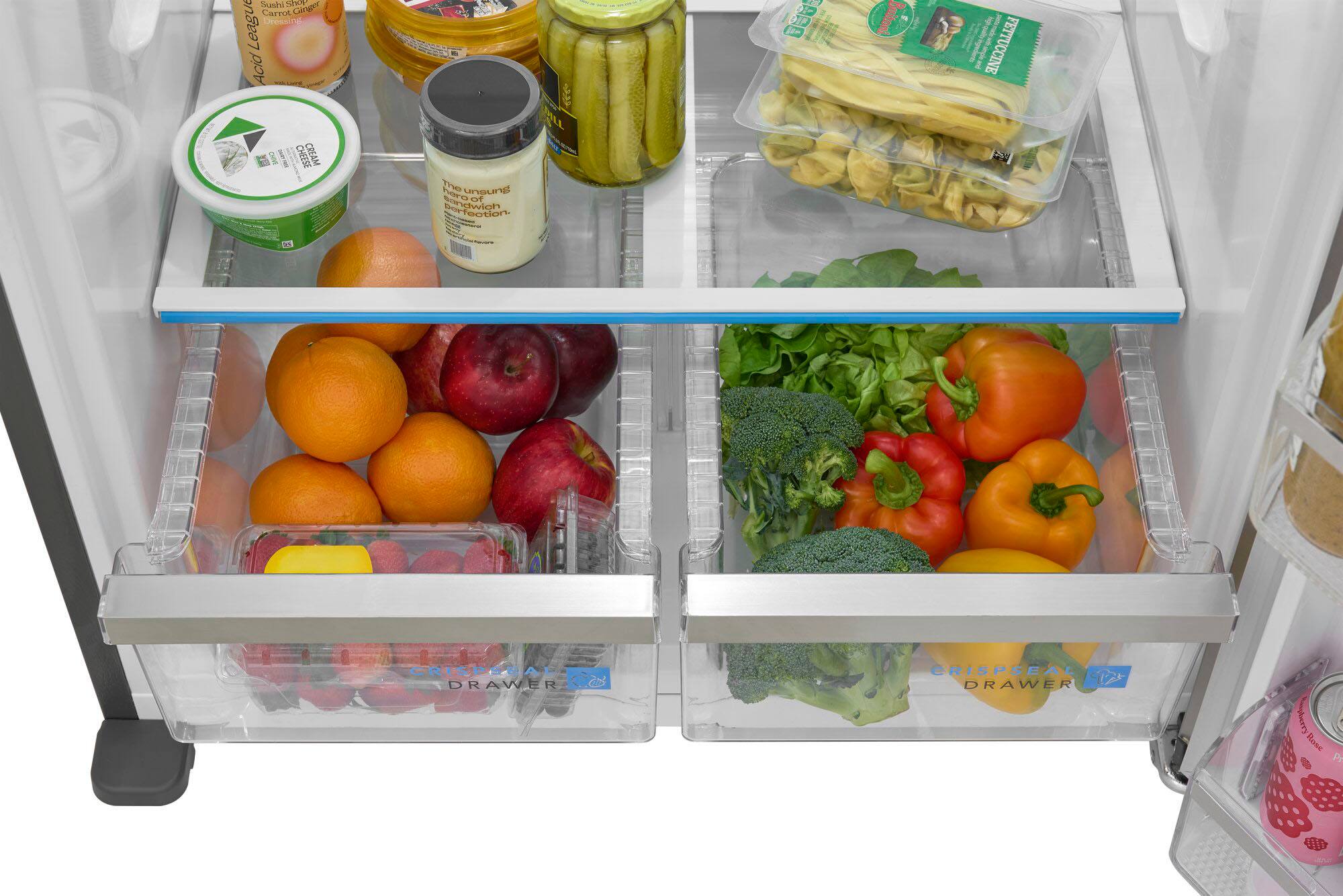 The image shows a refrigerator with two drawers filled with various fruits and vegetables. The first drawer contains apples, oranges, and broccoli, while the second drawer has bananas and tomatoes. The refrigerator also has a shelf with a container of yogurt and a container of cream cheese. The image is a white background, and the refrigerator is placed on a table.