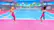 Two women playing tennis on a pink court.
