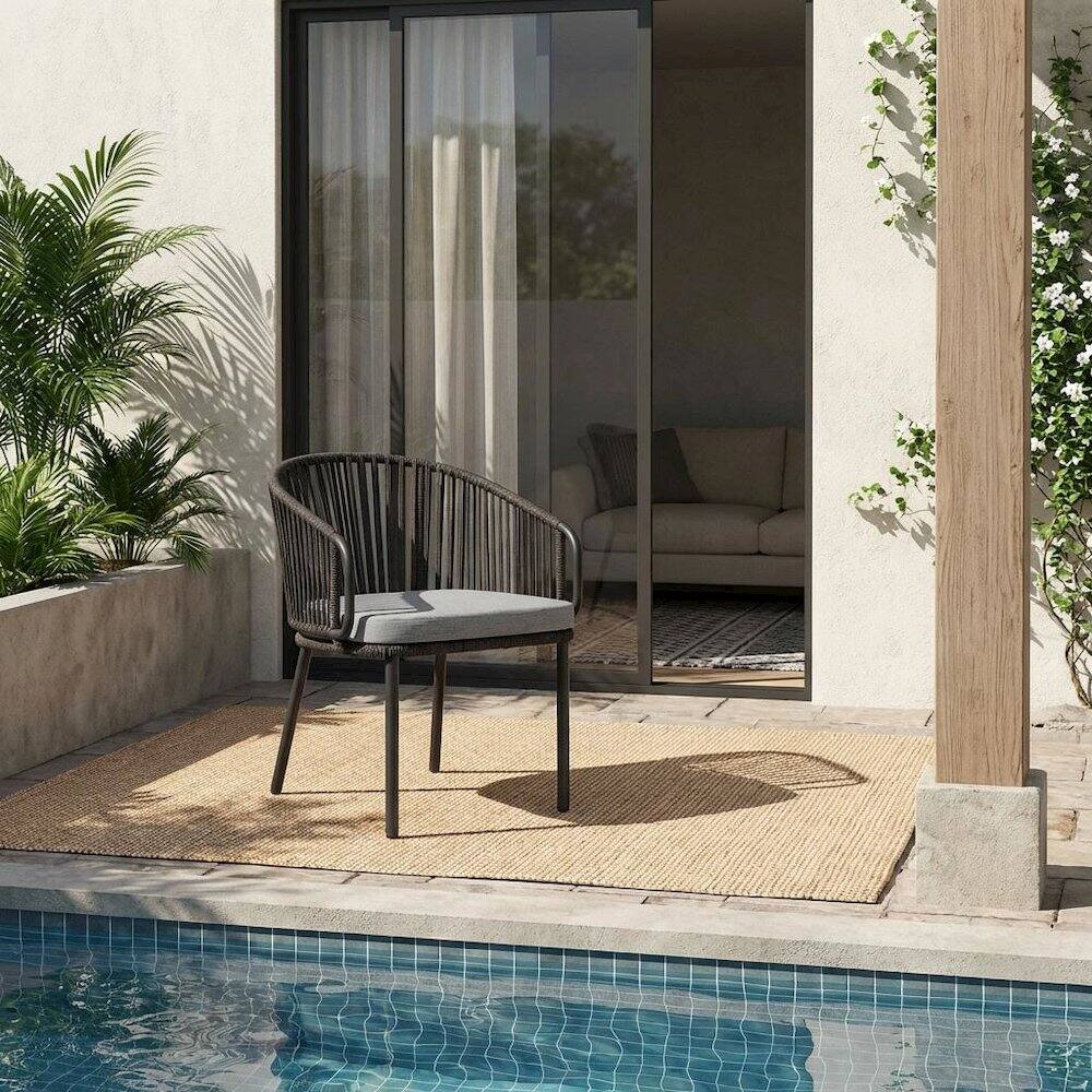 Angle. Outdoor Escape - Outdoor Patio Armchair With Cushioned Seat And Armrests - Gray.