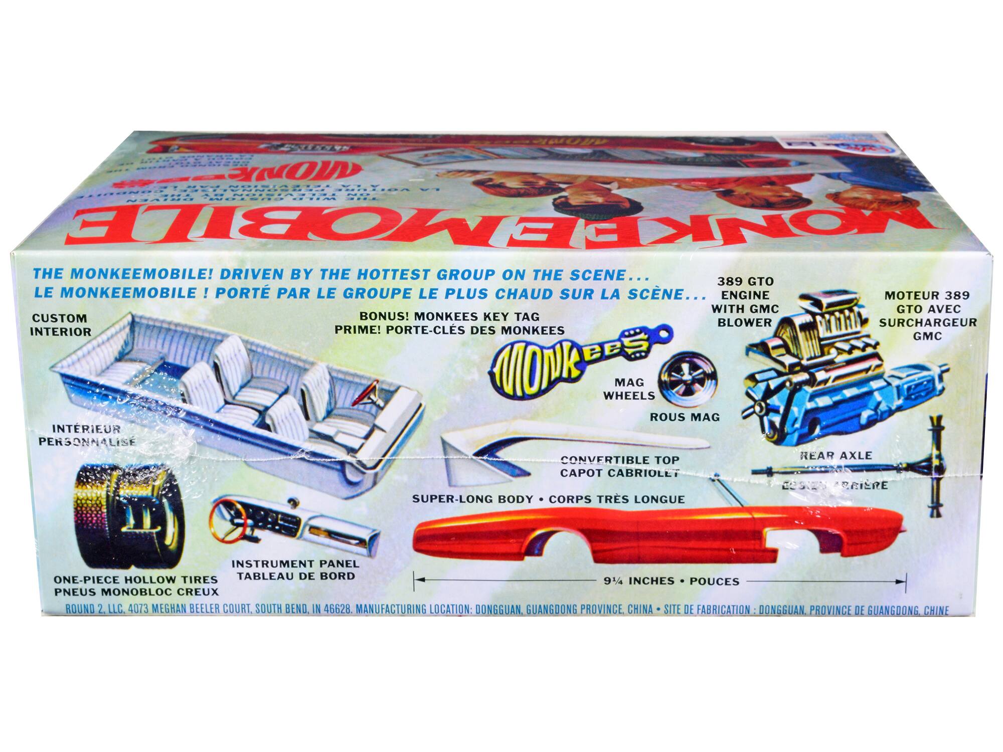 Sure, here is the corrected and grouped text from the image:

---

**THE MONKEEMOBILE! DRIVEN BY THE HOTTEST GROUP ON THE SCENE...**  
**LE MONKEEMOBILE! PORTÉ PAR LE GROUPE LE PLUS CHAUD SUR LA SCÈNE...**

**CUSTOM INTERIOR**  
**INTÉRIEUR PERSONNALISÉ**

**BONUS! MONKEES KEY TAG**  
**PRIME! PORTE-CLES DES MONKEES**

**389 GTO ENGINE WITH GMC BLOWER**  
**MOTEUR 389 GTO AVEC SURCHARGEUR GMC**

**MAG WHEELS**  
**ROUES MAG**

**CONVERTIBLE TOP**  
**CAPOT CABRIOLE**

**SUPER-LONG BODY**  
**CORPS TRÈS LONG**

**INSTRUMENT PANEL**  
**TABLEAU DE BORD**

**ONE-PIECE HOLLOW TIRES**  
**PNEUS MONOBLOC CREUX**

**9½ INCHES**  
**POUCES**

**ROUND 2, LLC. 4073 MEGHAN BEELER COURT, SOUTH BEND, IN 4662