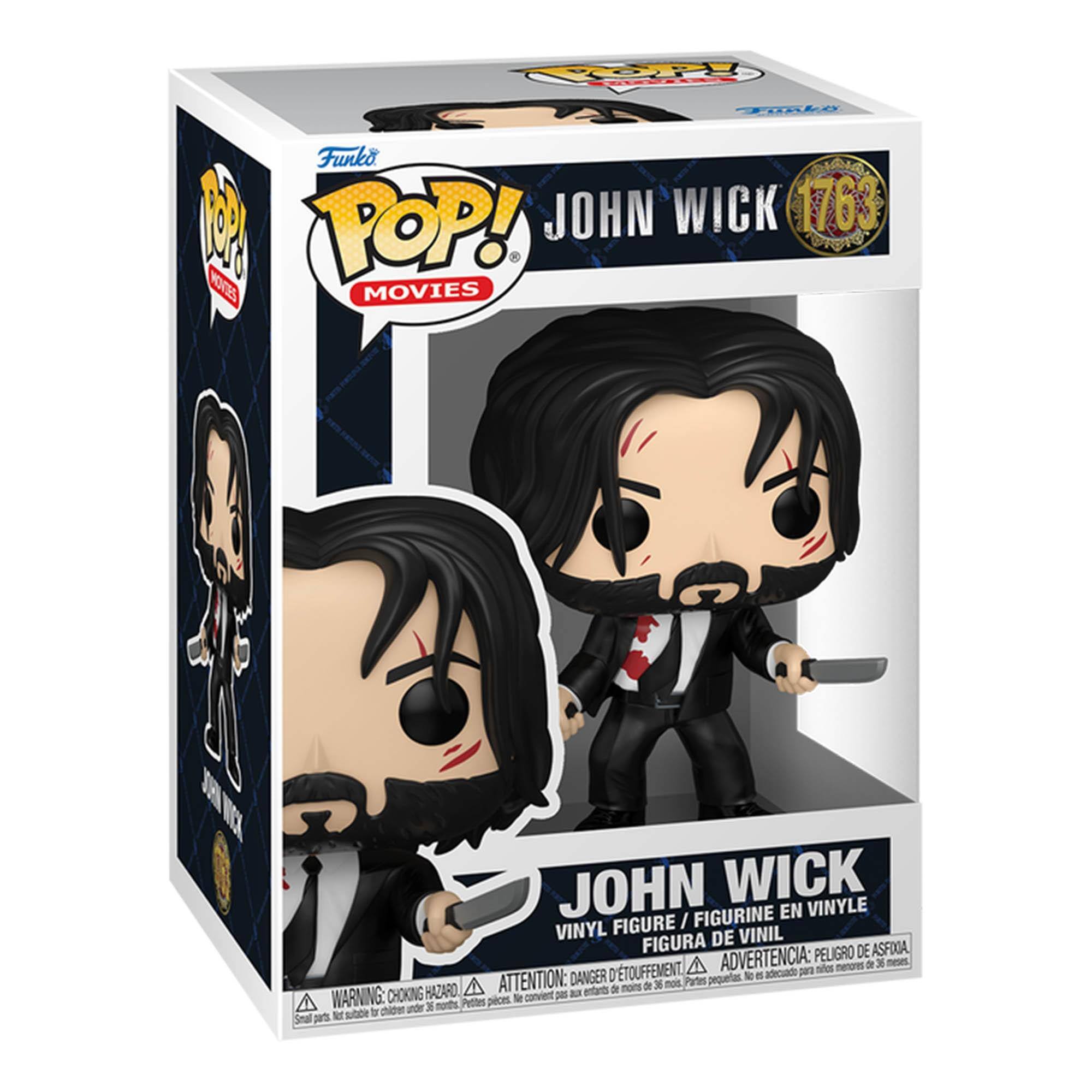 Sure, here is the corrected and grouped text from the image:

---

**Top Left:**
- Funko
- POP! MOVIES

**Top Center:**
- JOHN WICK 1763

**Center:**
- JOHN WICK
- VINYL FIGURE / FIGURINE EN VINYLE
- FIGURA DE VINIL
- FIGURA DE VINIL

**Bottom Center:**
- WARNING: CHOKING HAZARD - Small parts not suitable for children under 3 years.
- ATTENTION: PELIGRO DE ASFIXIA - Piezas pequeñas no son adecuadas para menores de 3 años.
- ADVERTENCIA: DANGER D'ÉTOUFFEMENT - Pièces petites non convenables pour les enfants de moins de 3 ans.

**Bottom Left:**
- Small parts not suitable for children under 3 years.
- Piezas pequeñas no son adecuadas para menores de 3 años.
- Pièces petites non convenables pour les enfants de moins de 3 ans.

---