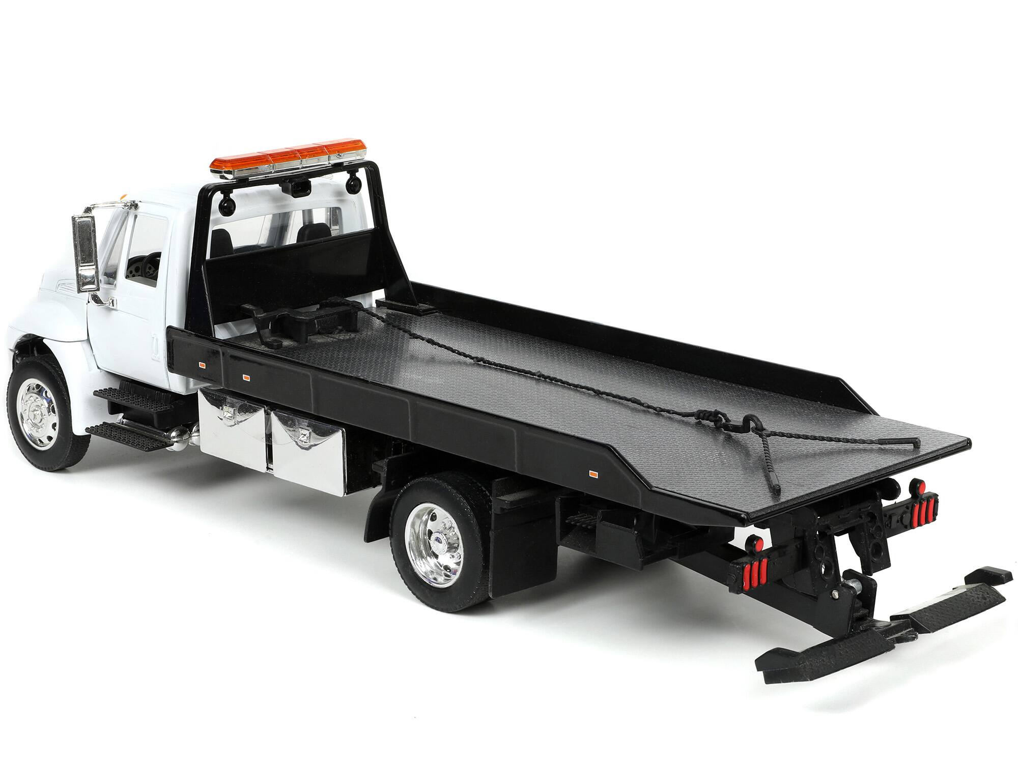 Alt View 3. Jada - International DuraStar 4400 Flatbed Tow Truck White 1/24 Diecast Model by Jada.