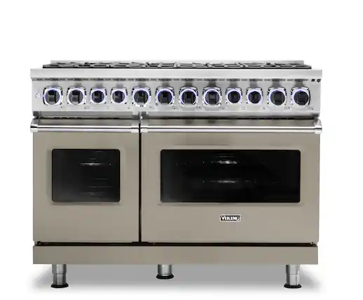 The image features a large, stainless steel, commercial-grade oven with a row of 12 oven lights. The oven is made by Viking, a well-known brand in the culinary industry. The oven is designed for professional use, ensuring that it can withstand the demands of a commercial kitchen. The oven's size and capacity make it suitable for cooking large quantities of food, making it an essential piece of equipment for any professional kitchen.