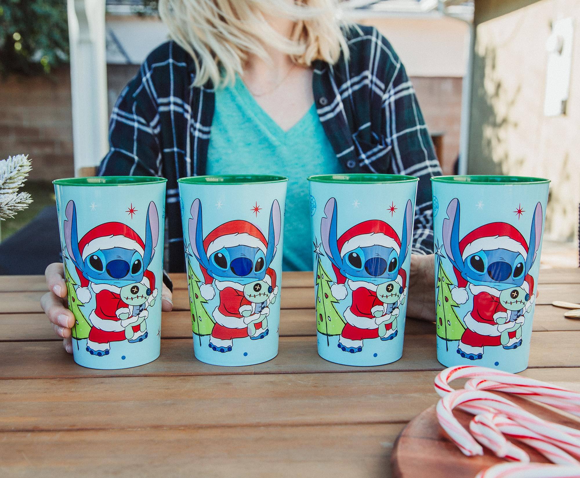 Alt View 10. Silver Buffalo - Disney Lilo & Stitch Santa Stitch 4-Piece Plastic Cup Set | Each Holds 22 Ounces - Blue.