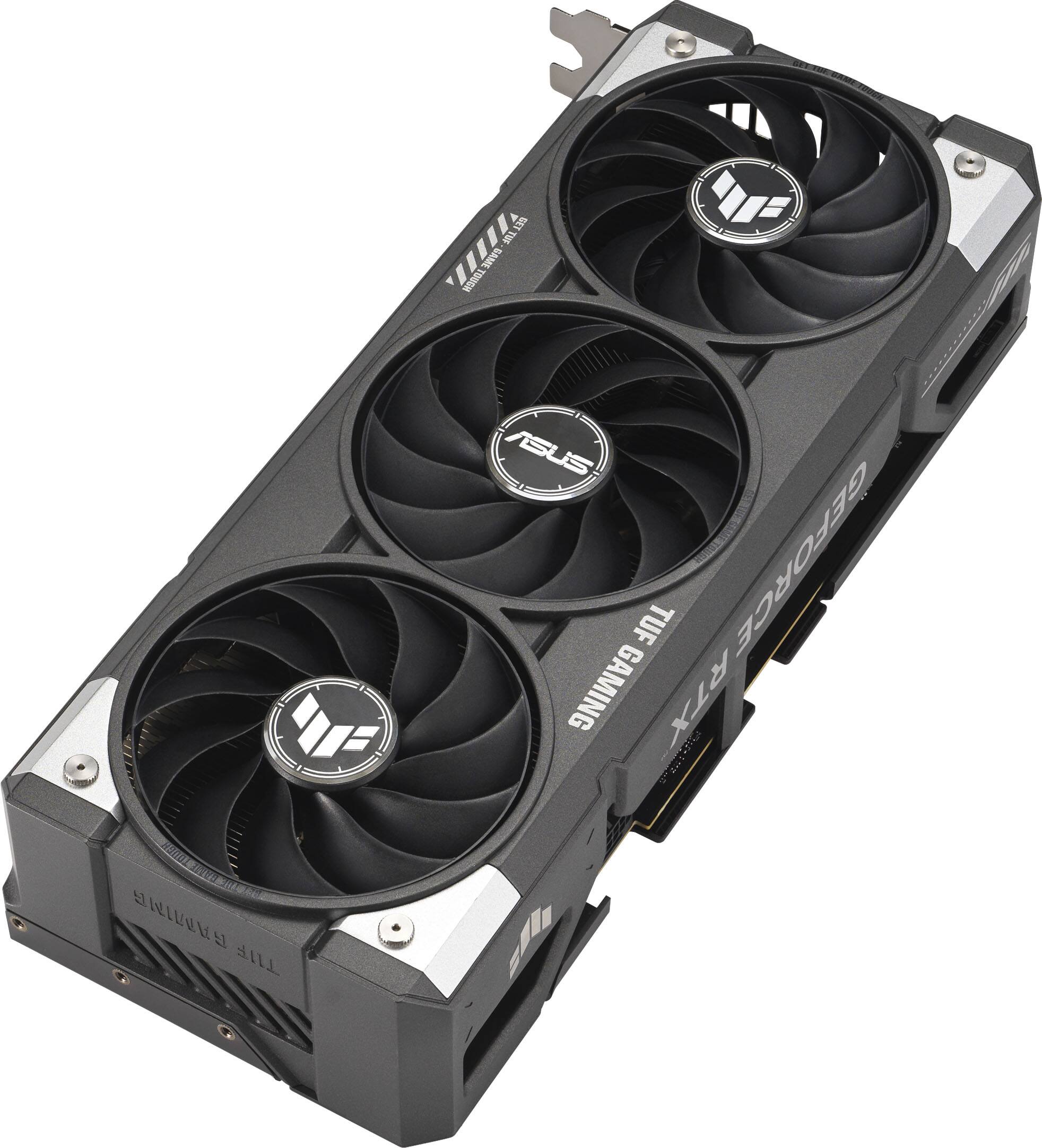 The image features a close-up of a black and gray Asus GeForce RTX 2070 graphics card. The card is designed for gaming and features a large fan to help cool the system. The card is a part of the TUF Gaming series, which is known for its durability and performance. The card is likely used in a computer setup for an enhanced gaming experience.
