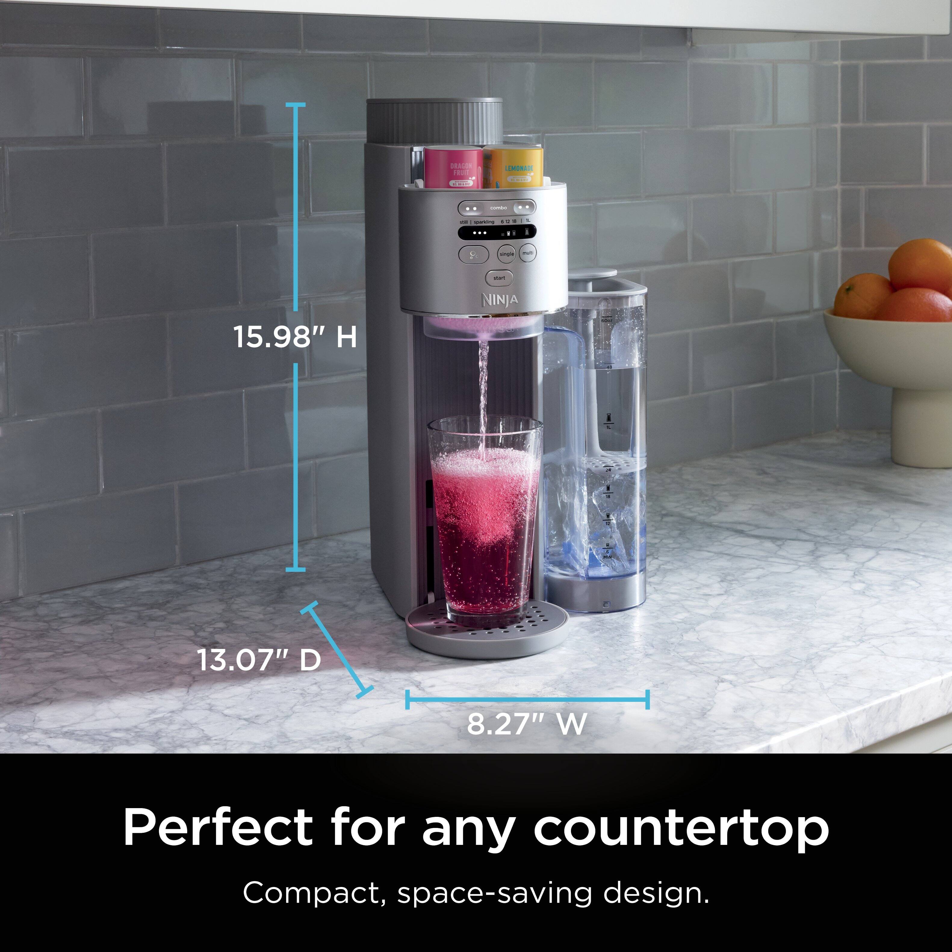 The image features a Ninja blender on a countertop, with a measuring stick next to it. The blender is perfect for any countertop, and its compact, space-saving design makes it an ideal choice for any kitchen.
