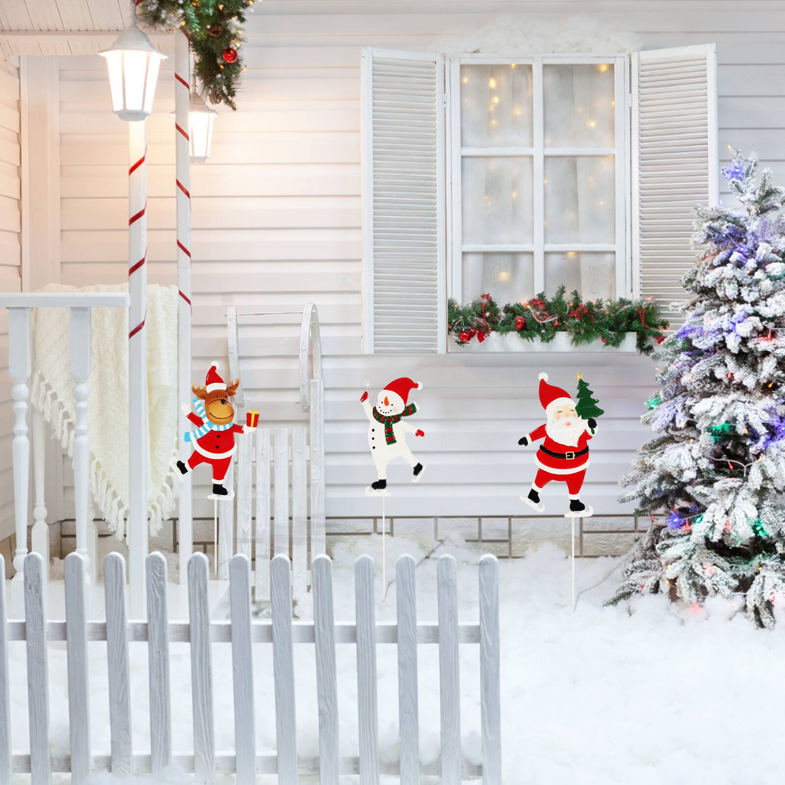 Alt View 2. Oumilen - 3‑Pack Christmas Skating Character Garden Stakes – Metal Signs with Santa, Snowman & Reindeer for Lawn Pathway.