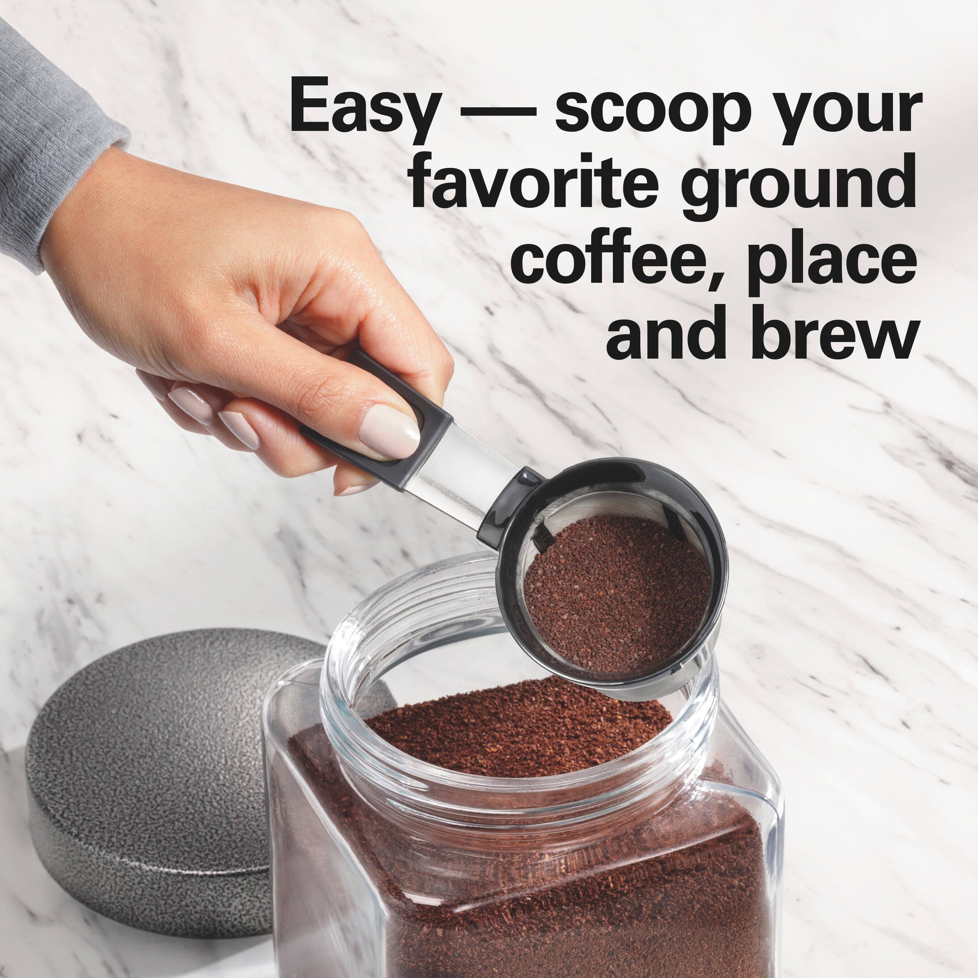 Easy — scoop your favorite ground coffee, place and brew