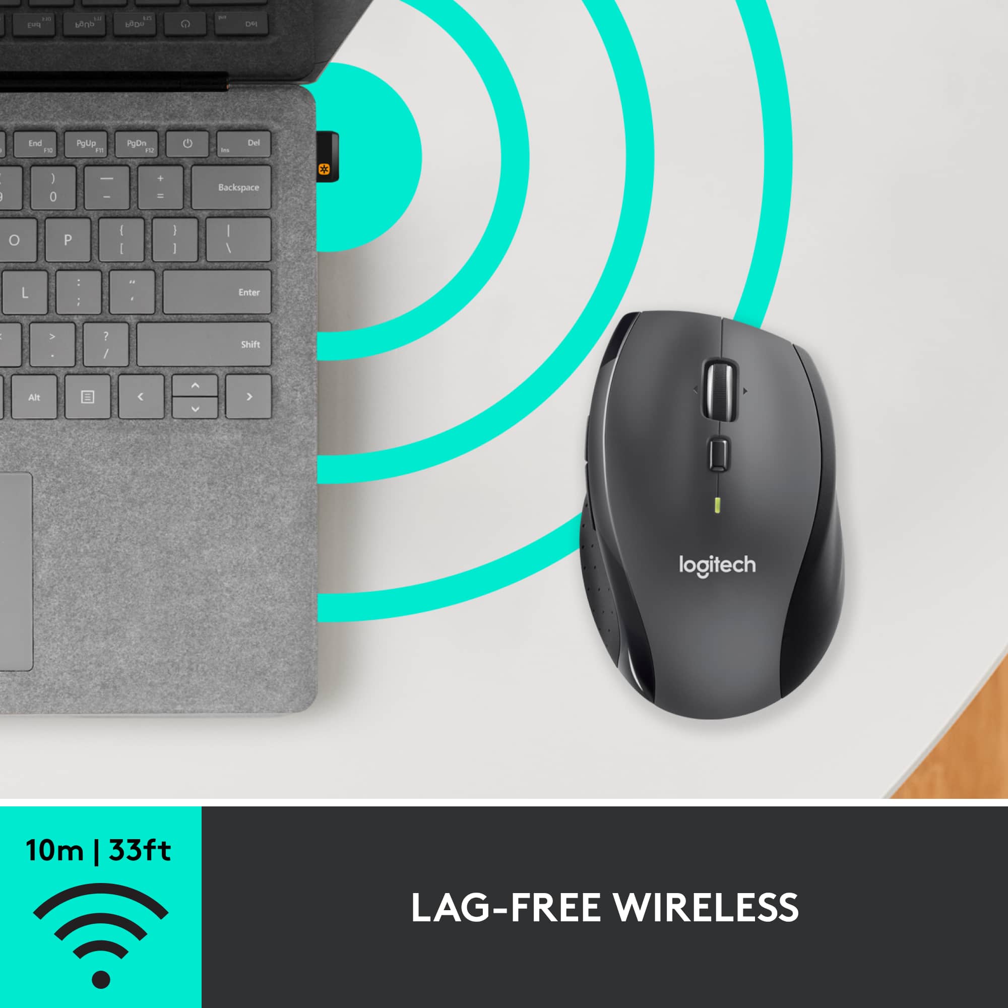 The image features a laptop computer with a wireless mouse next to it. The mouse is a Logitech product, and it is designed to provide lag-free wireless connectivity. The laptop and mouse are placed on a table, and the mouse is positioned to the right of the laptop. The image is promoting the wireless mouse as a convenient and reliable device for use with the laptop.