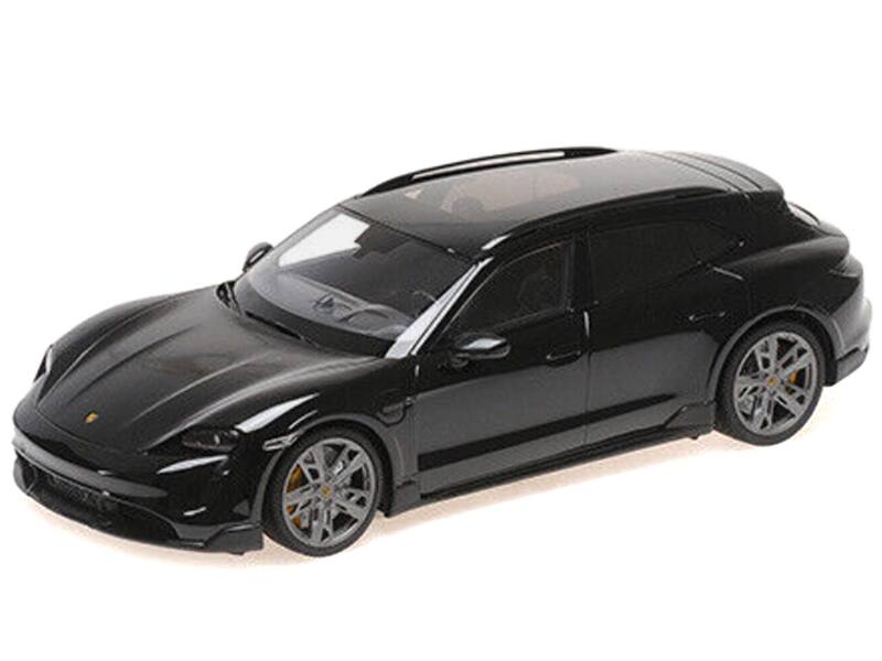 Angle. Minichamps - 2021 Porsche Taycan CUV Turbo S Black Limited Edition to 480 pieces Worldwide 1/18 Diecast Model Car by Minichamps - Black.
