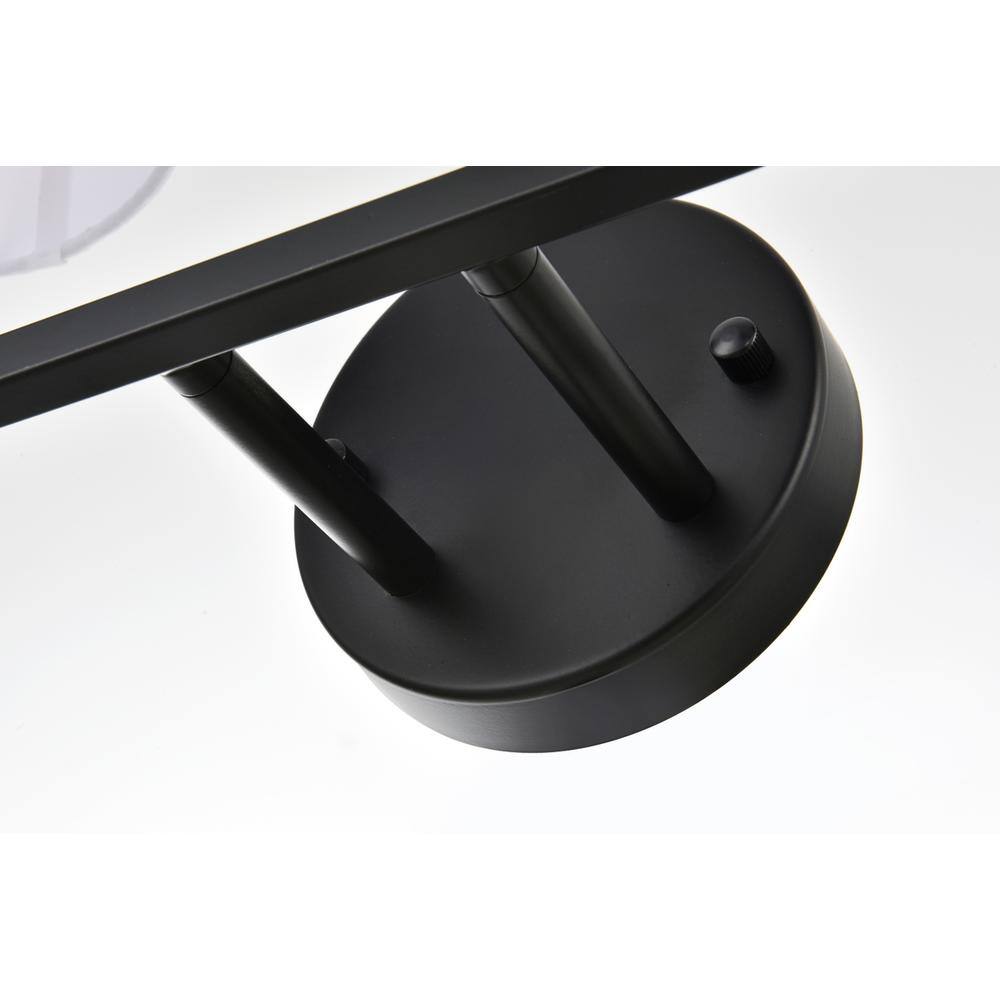 Left. Living District - Colson 4 light Black and Clear Bath Sconce - Black And Clear.