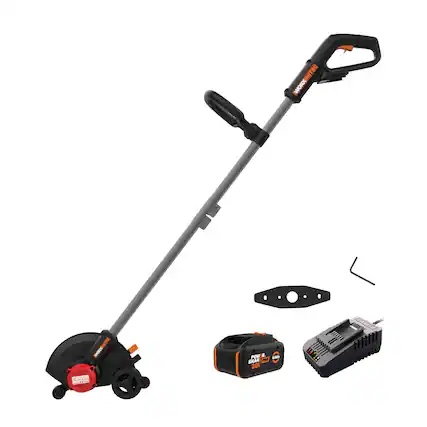 The image features a black and orange electric lawn mower with a red handle. The mower is accompanied by a set of tools, including a drill and a wrench. The tools are placed next to the mower, ready for use. The mower is designed to provide more power and efficiency for lawn care tasks.