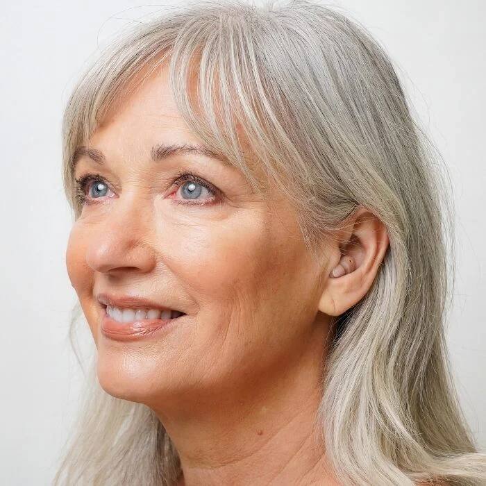 Alt View 7. Ceretone - Torch OTC Hearing Aids - Rechargeable, Wind Noise Reduction, 5 Preset Programs, Light Weight Design - The left is blue.The right is red..