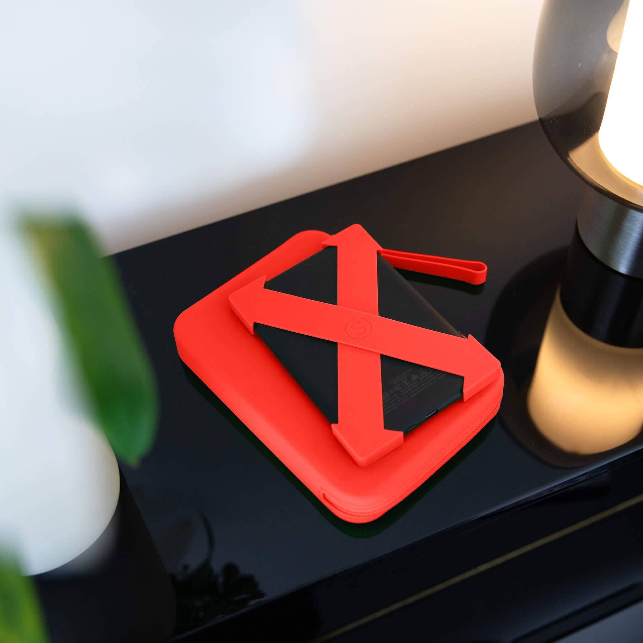 Angle. Strapsicle - Clutch for E-Readers - 6.8″–7″ Paperwhite 2024, 6″ Kindles, Kobos, Nook & iPad mini 6 - Anti-Dust Coating - Burnt Orange - Burnt Orange.