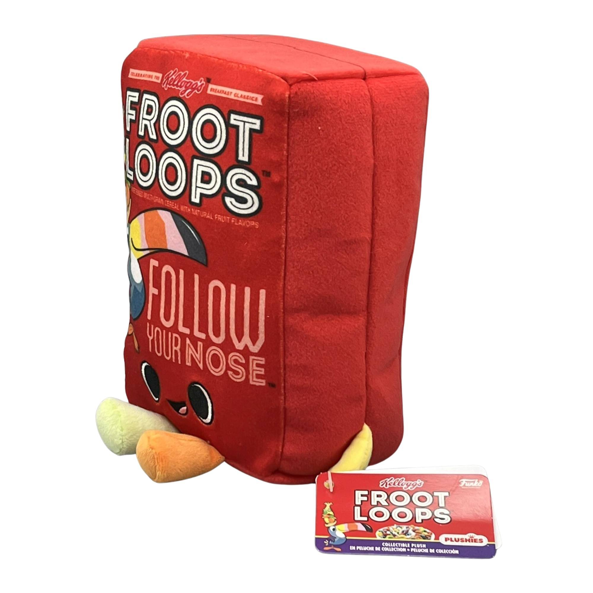 Sure, here is the corrected and grouped text from the image:

**Front of the Box:**
- Kellogg's
- FROOT LOOPS
- REAL NATURAL CLASSICS
- FROOT LOOPS
- FROOT LOOPS CEREAL WITH NATURAL FRUIT FLAVORS
- FOLLOW YOUR NOSE

**Side of the Box:**
- Kellogg's
- FROOT LOOPS
- PLUSHIES
- COLLECTIBLE PLUSHIES
- 9 PLUSHIES IN EACH BOX
- IN PUZZLE ME COLLECTION
- PUZZLE ME COLLECTION

**Bottom of the Box:**
- Kellogg's
- FROOT LOOPS
- PLUSHIES
- COLLECTIBLE PLUSHIES
- 9 PLUSHIES IN EACH BOX
- IN PUZZLE ME COLLECTION
- PUZZLE ME COLLECTION