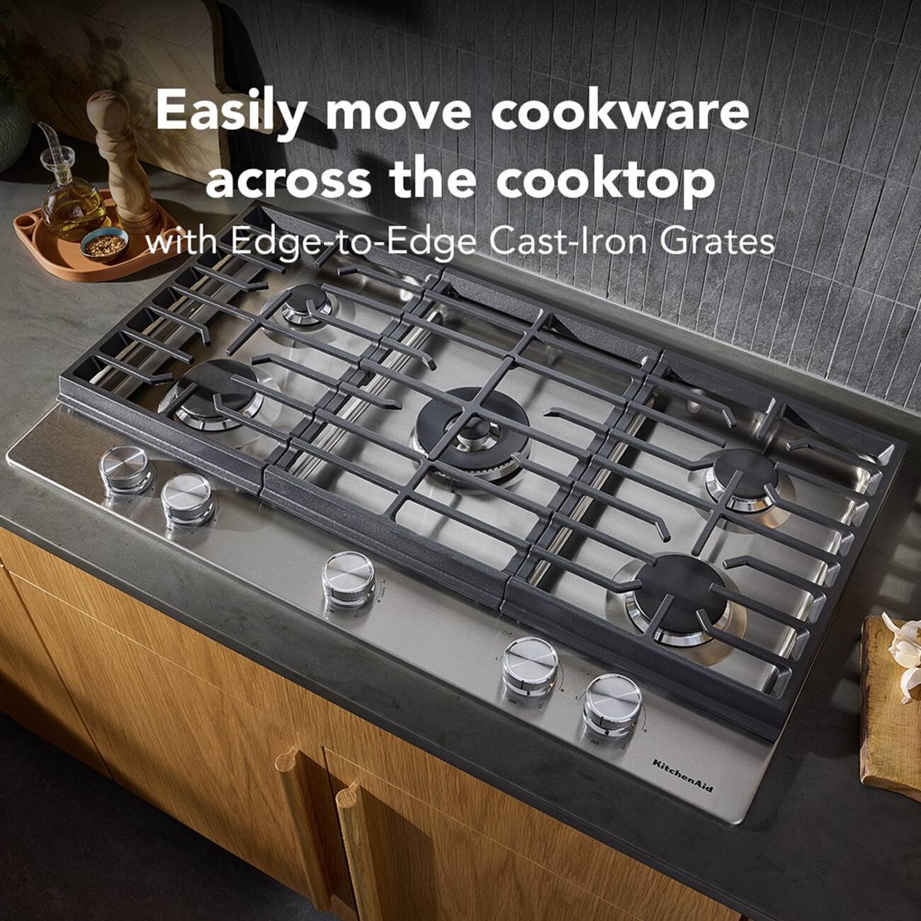 Easily move cookware across the cooktop with Edge-to-Edge Cast-Iron Grates KitchenAid