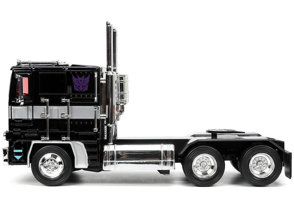 Angle. Jada - Decepticon Nemesis Prime with Robot on Chassis "Transformers" TV Series "Hollywood Rides" Series 1/24 - Black.